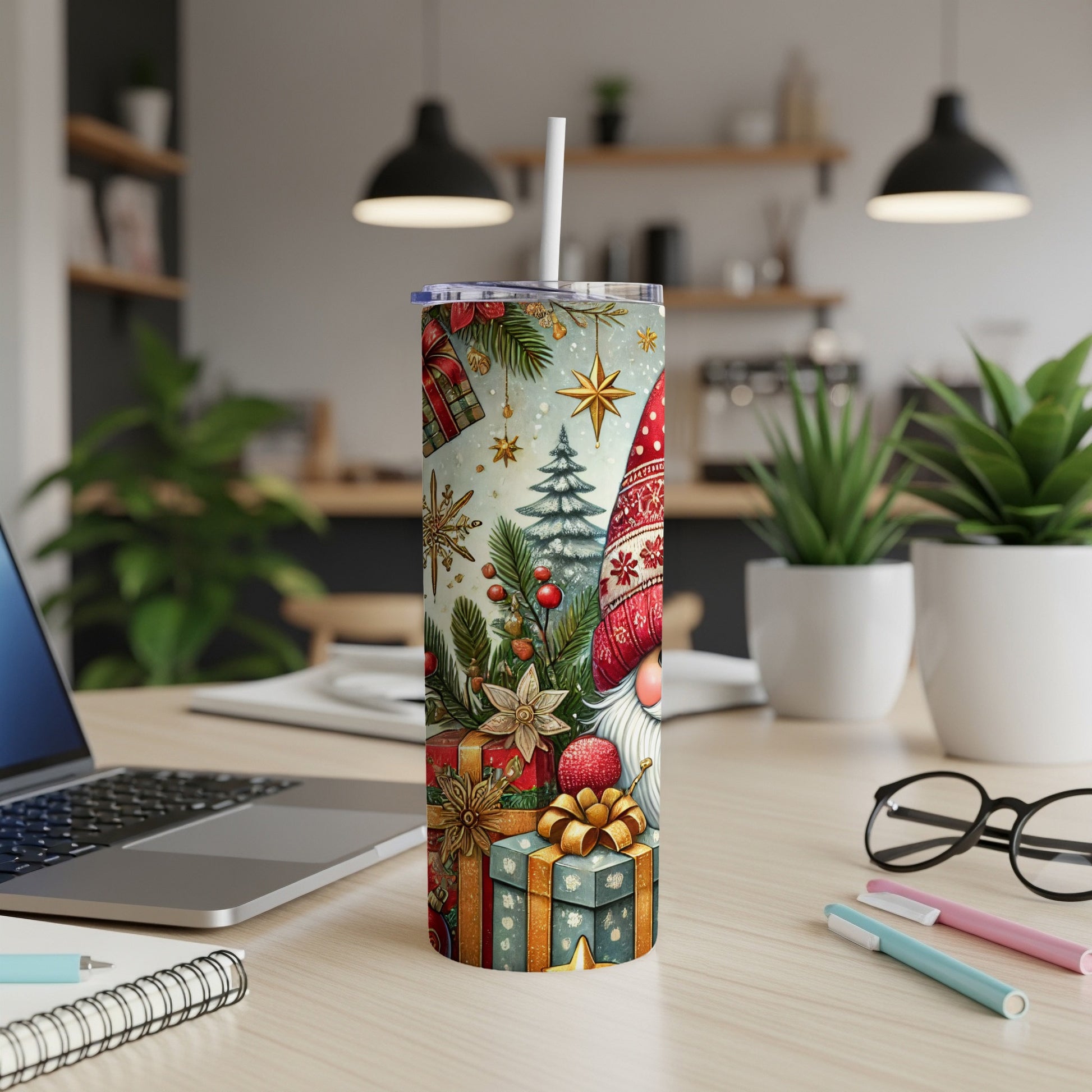 Christmas gnome and gifts adorn a white insulated tumbler with straw.