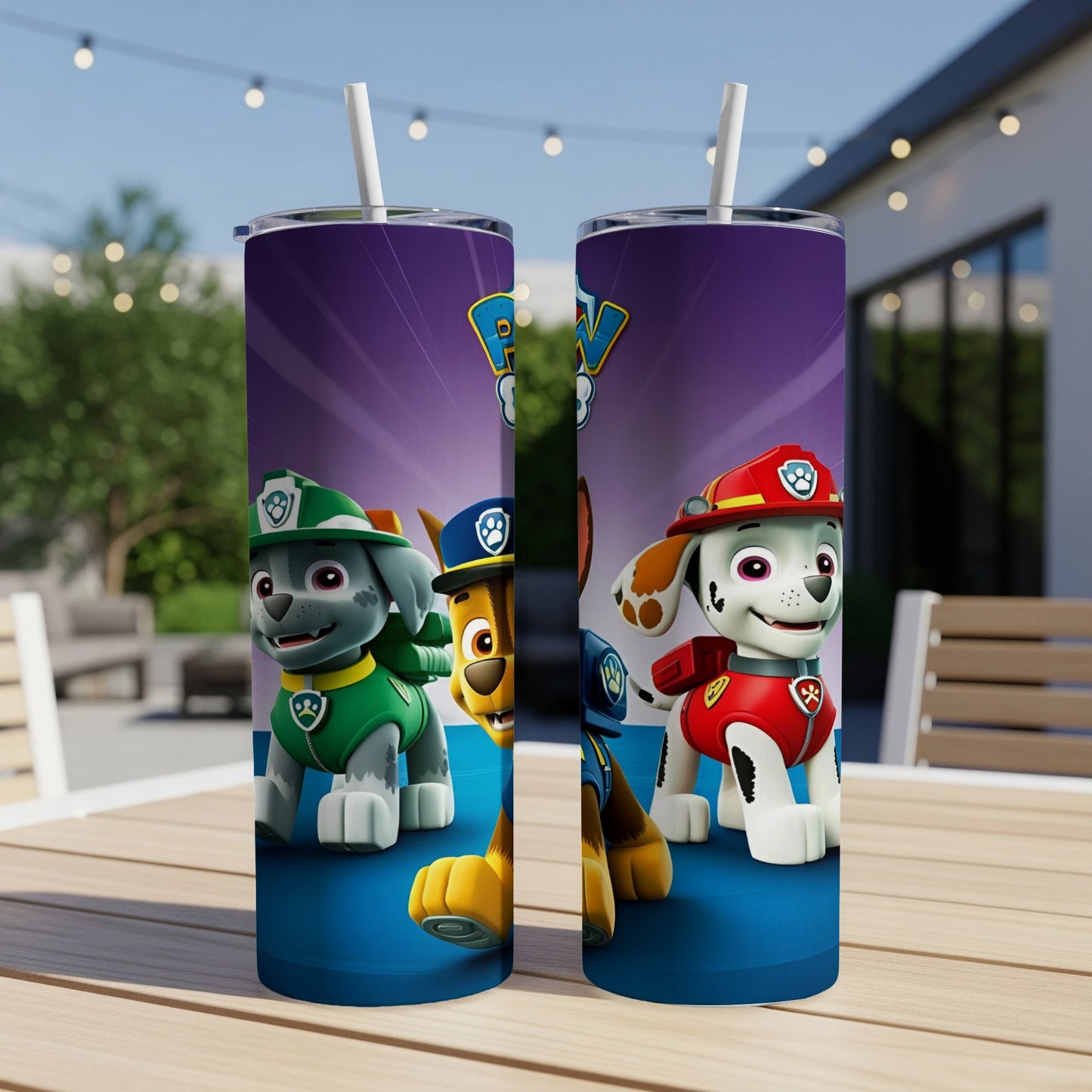 Two Paw Patrol character tumblers with Chase and Marshall on a table.