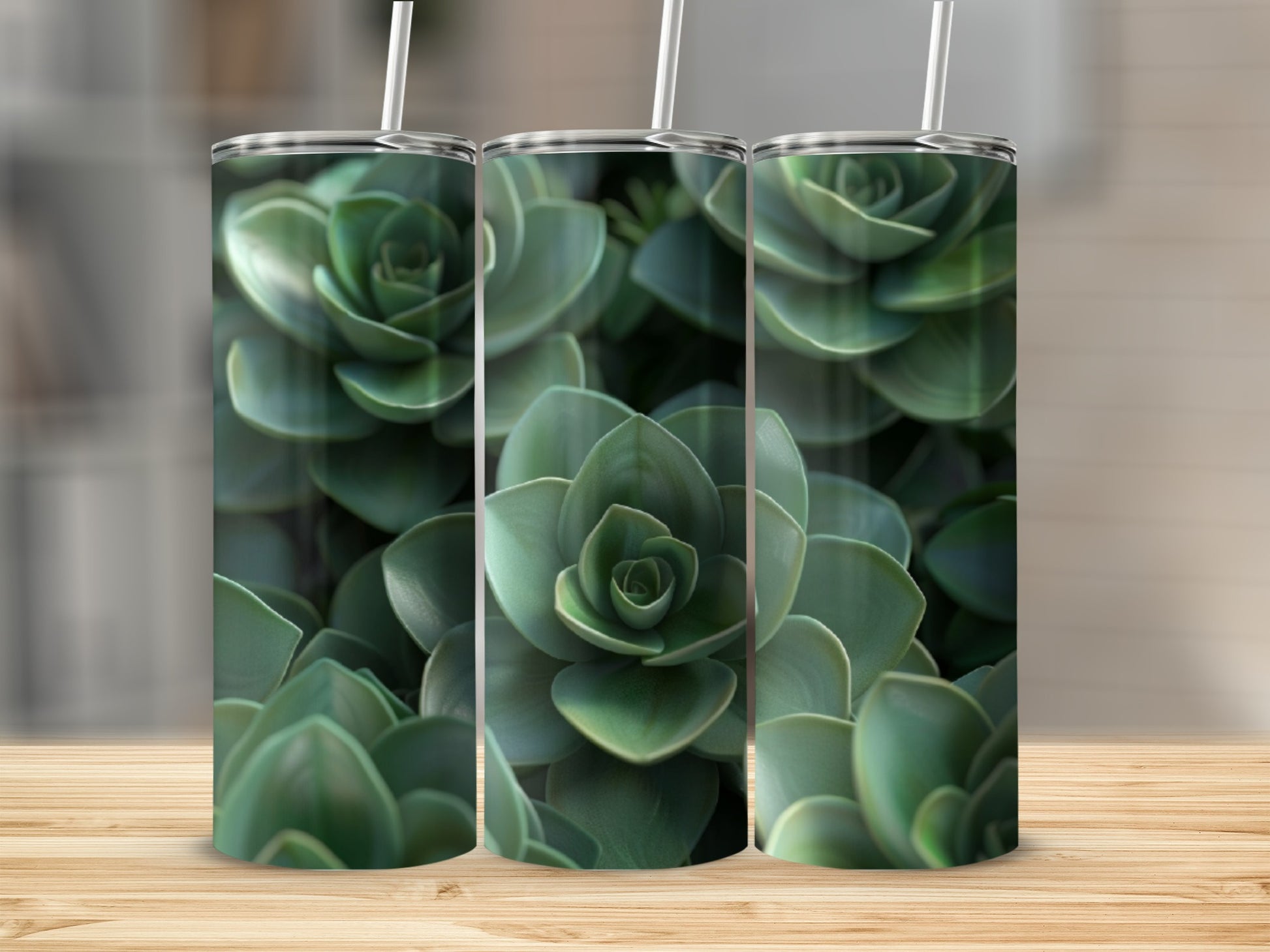 Three tumblers display a close-up pattern of green succulent leaves.