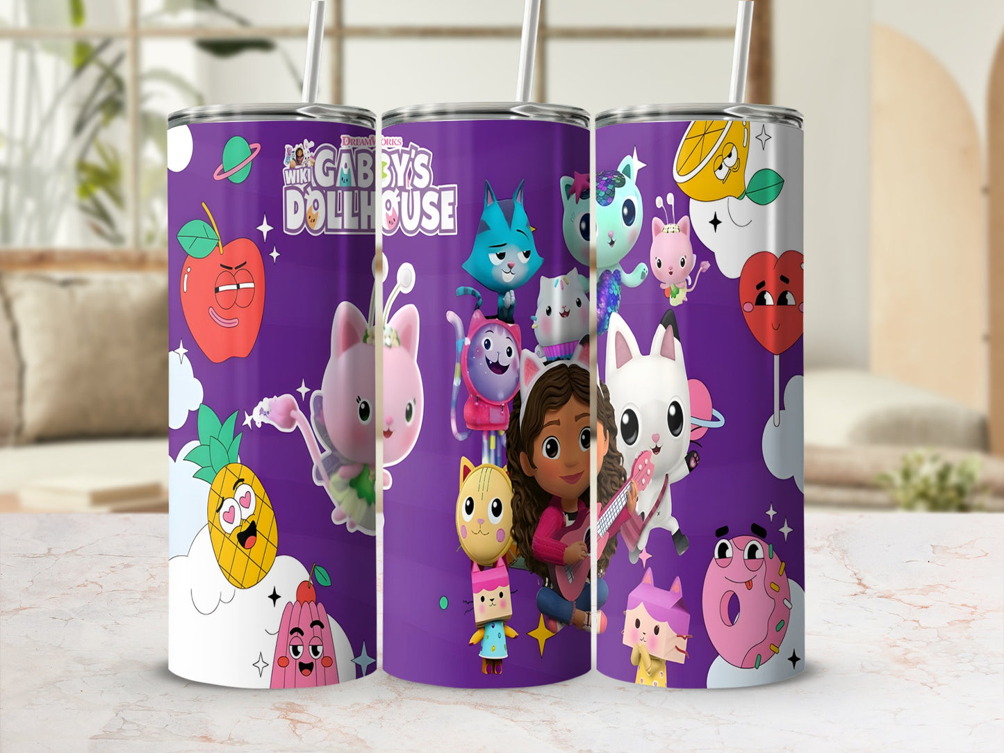 Gabby's Dollhouse themed tumblers with character illustrations and fruit designs.