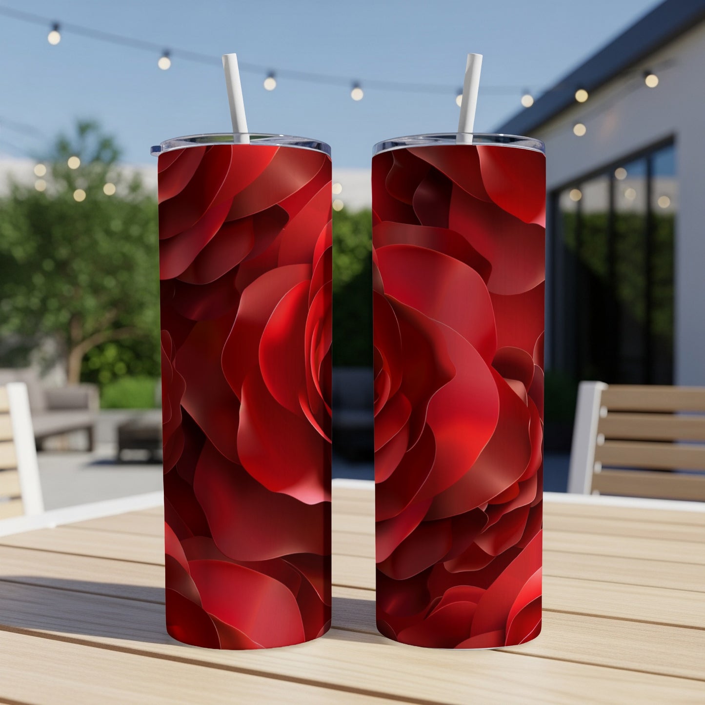 Two tall tumblers with a detailed red rose petal design.
