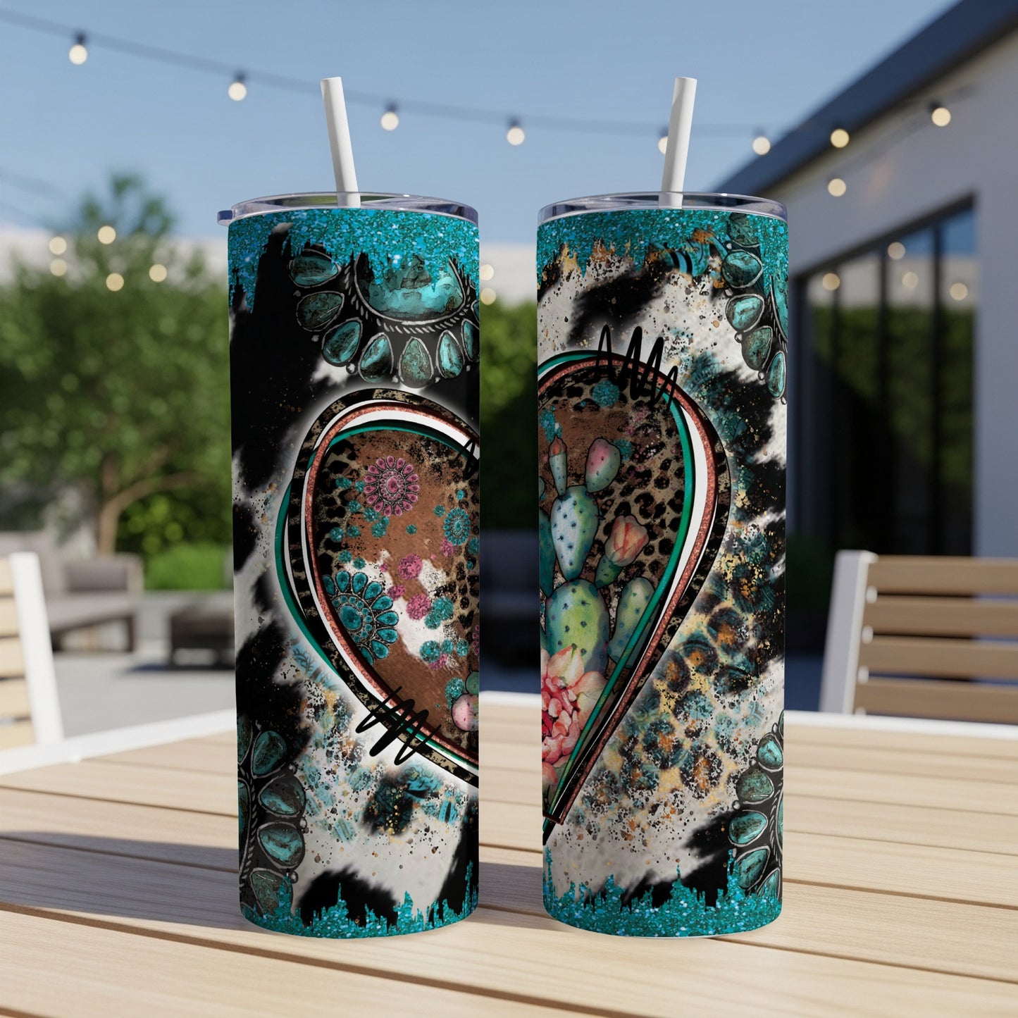 Two teal-lidded tumblers with desert heart, cactus, and leopard print designs.