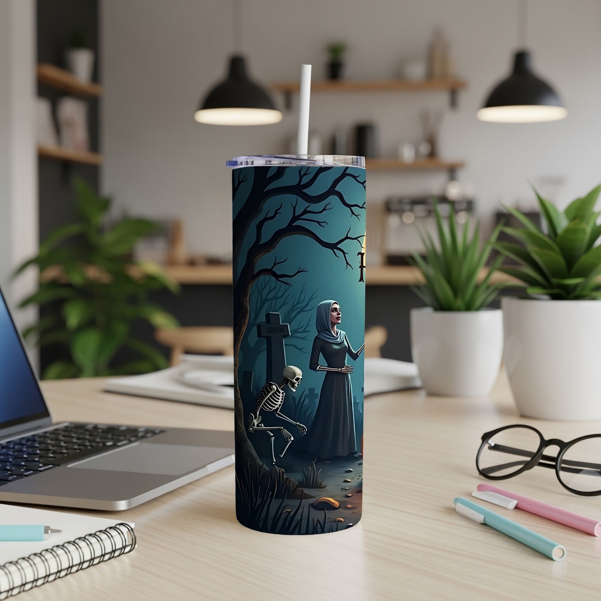 Tumbler with spooky graveyard scene: skeleton, robed figure, and gravestone.