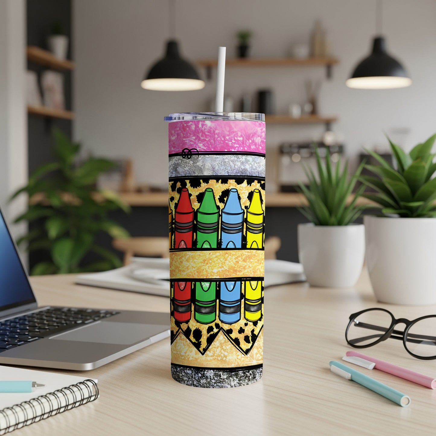 Skinny tumbler with colorful crayons and leopard print design.