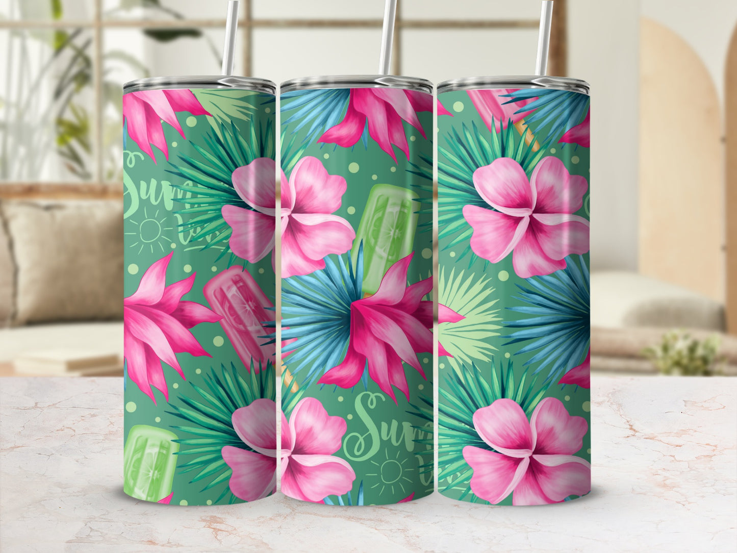 Pink flowers and green tropical leaves on a tumbler with a "Summer" sunburst pattern.