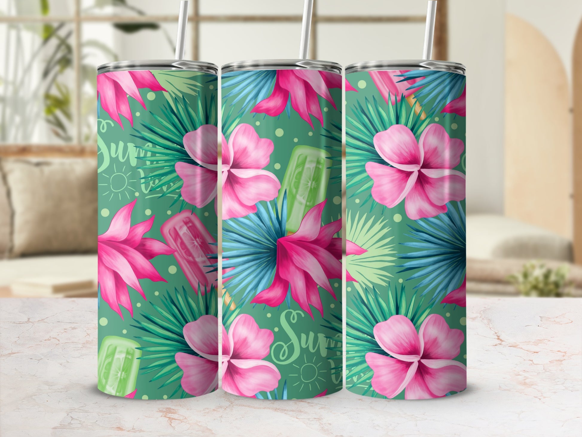 Pink flowers and green tropical leaves on a tumbler with a "Summer" sunburst pattern.