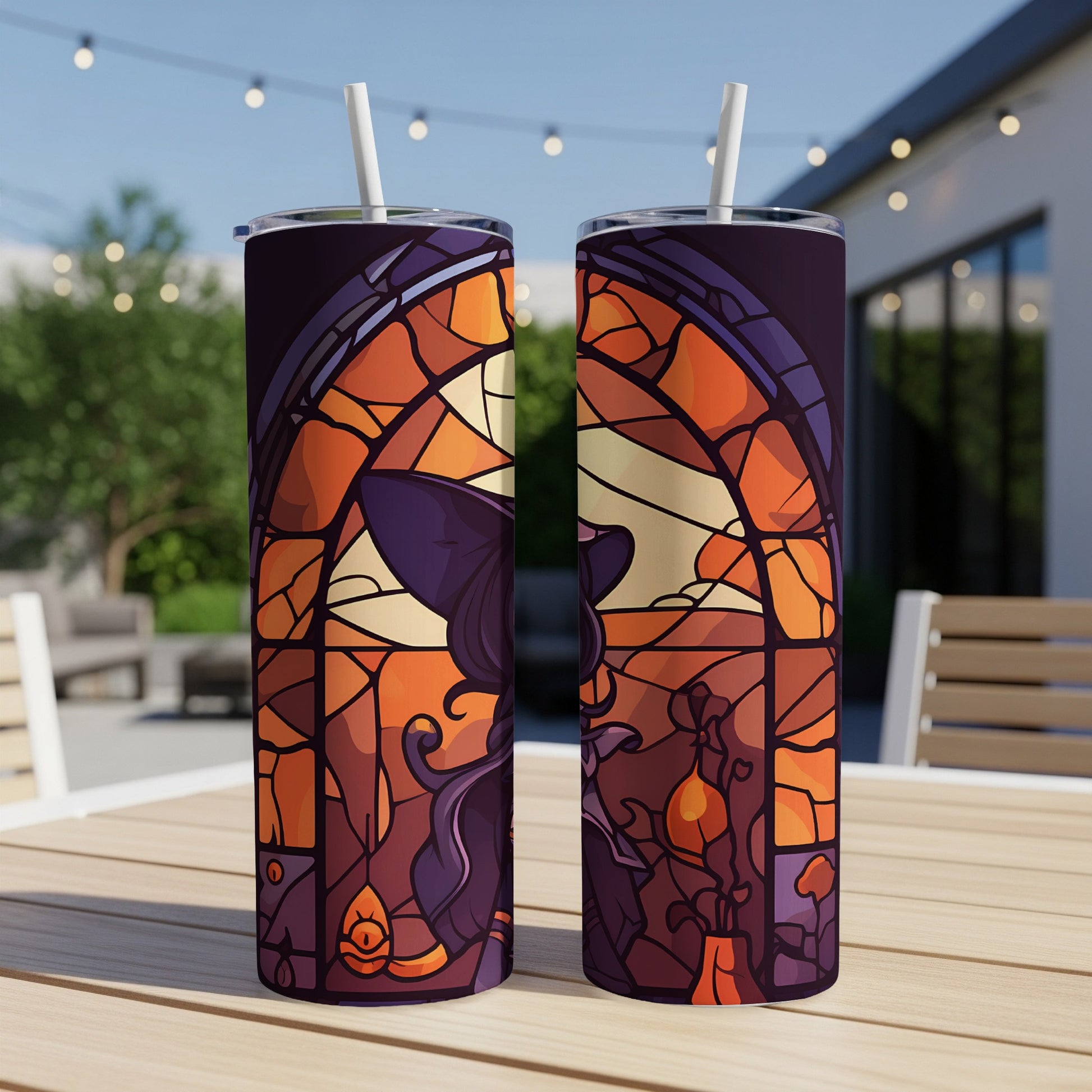 Two witch-themed tumblers with stained-glass window design.