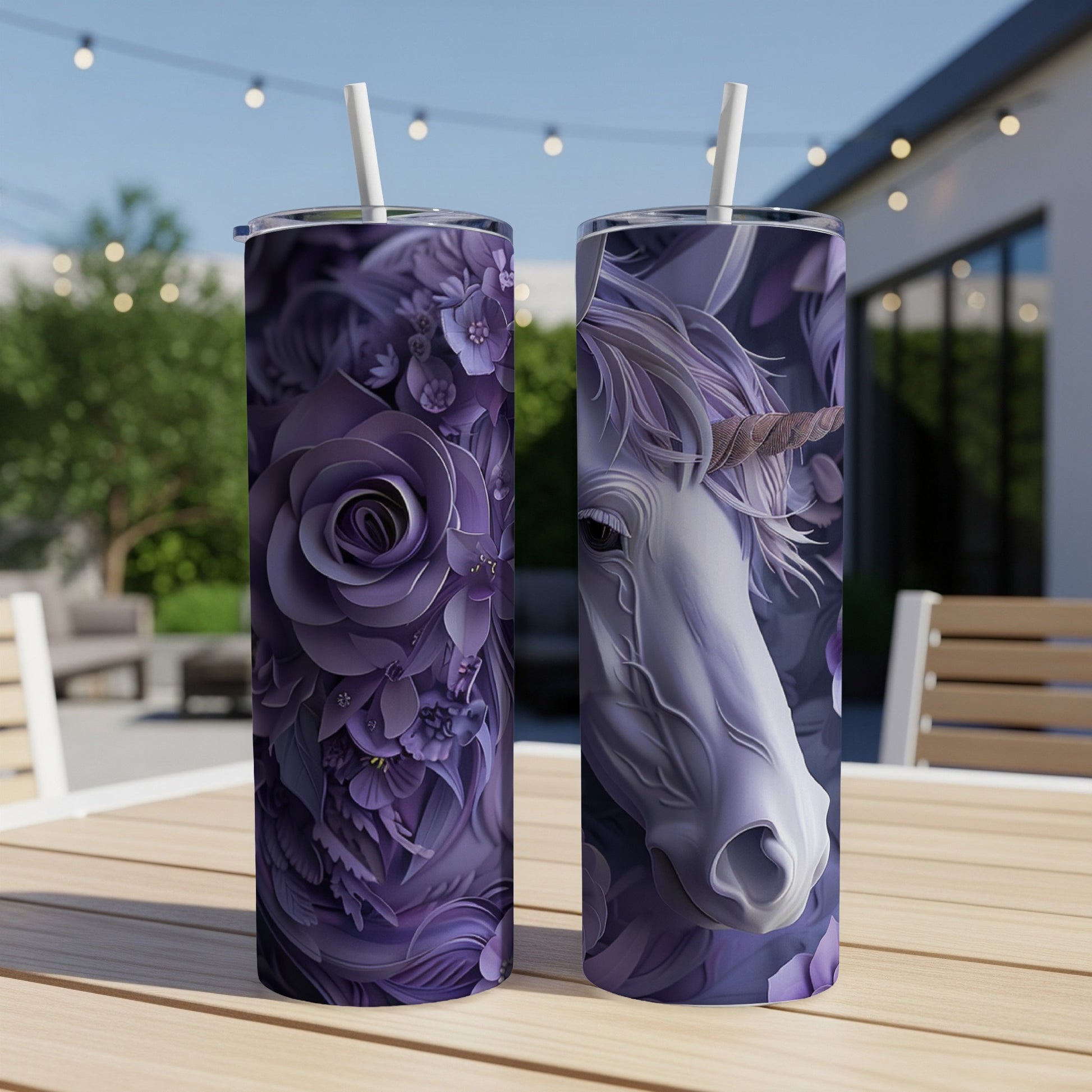 Two purple tumblers, one with a floral design, the other with a unicorn's head.