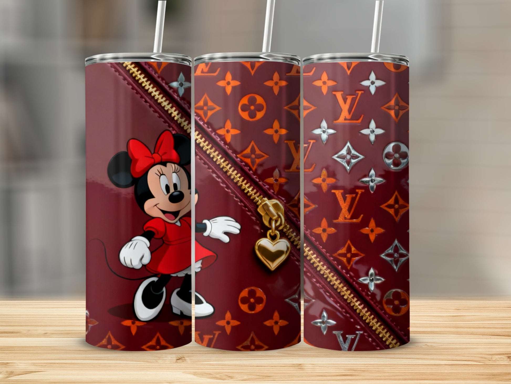 Minnie Mouse on maroon tumbler with LV pattern and gold heart zipper charm.