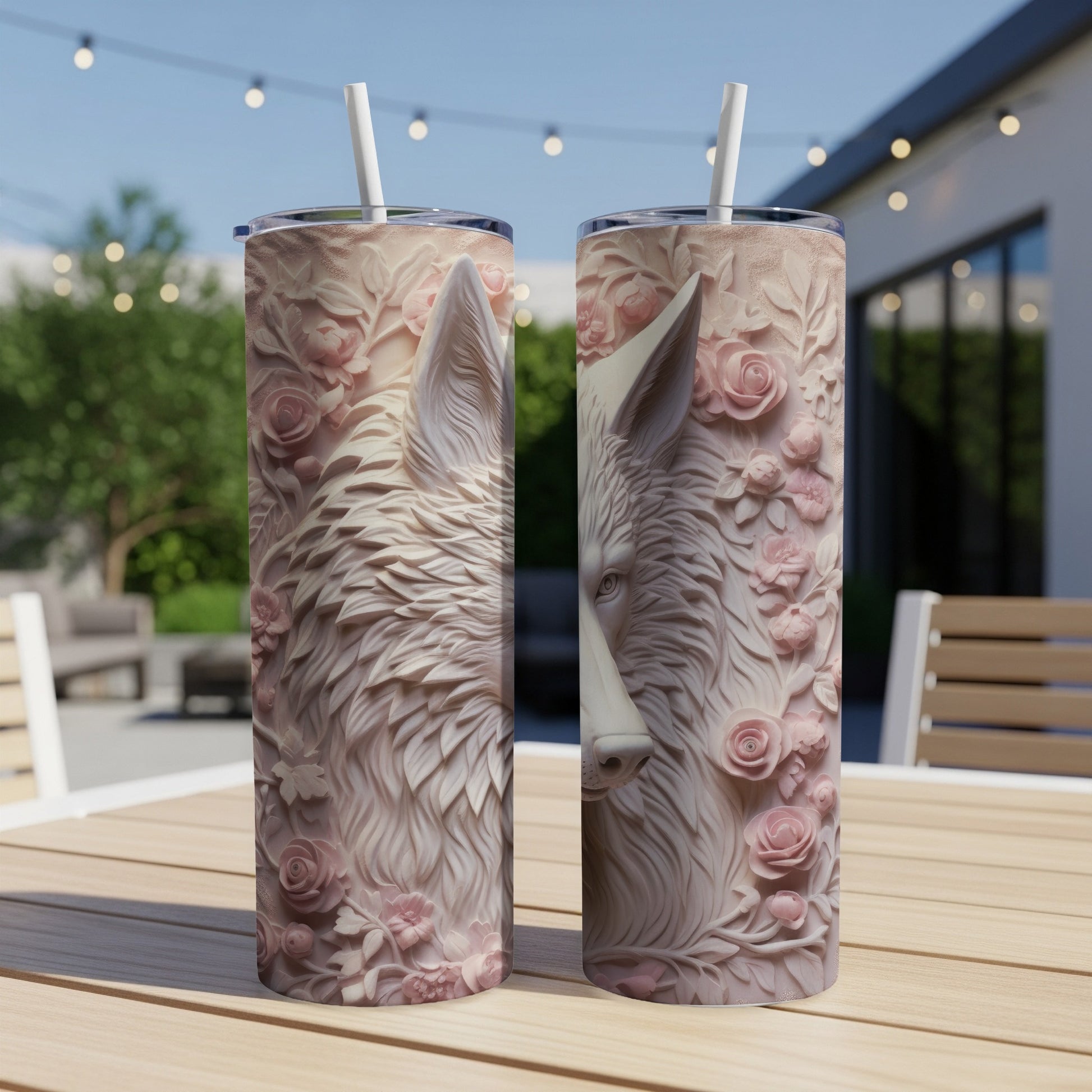 Two tumblers with a detailed wolf and floral embossed design.