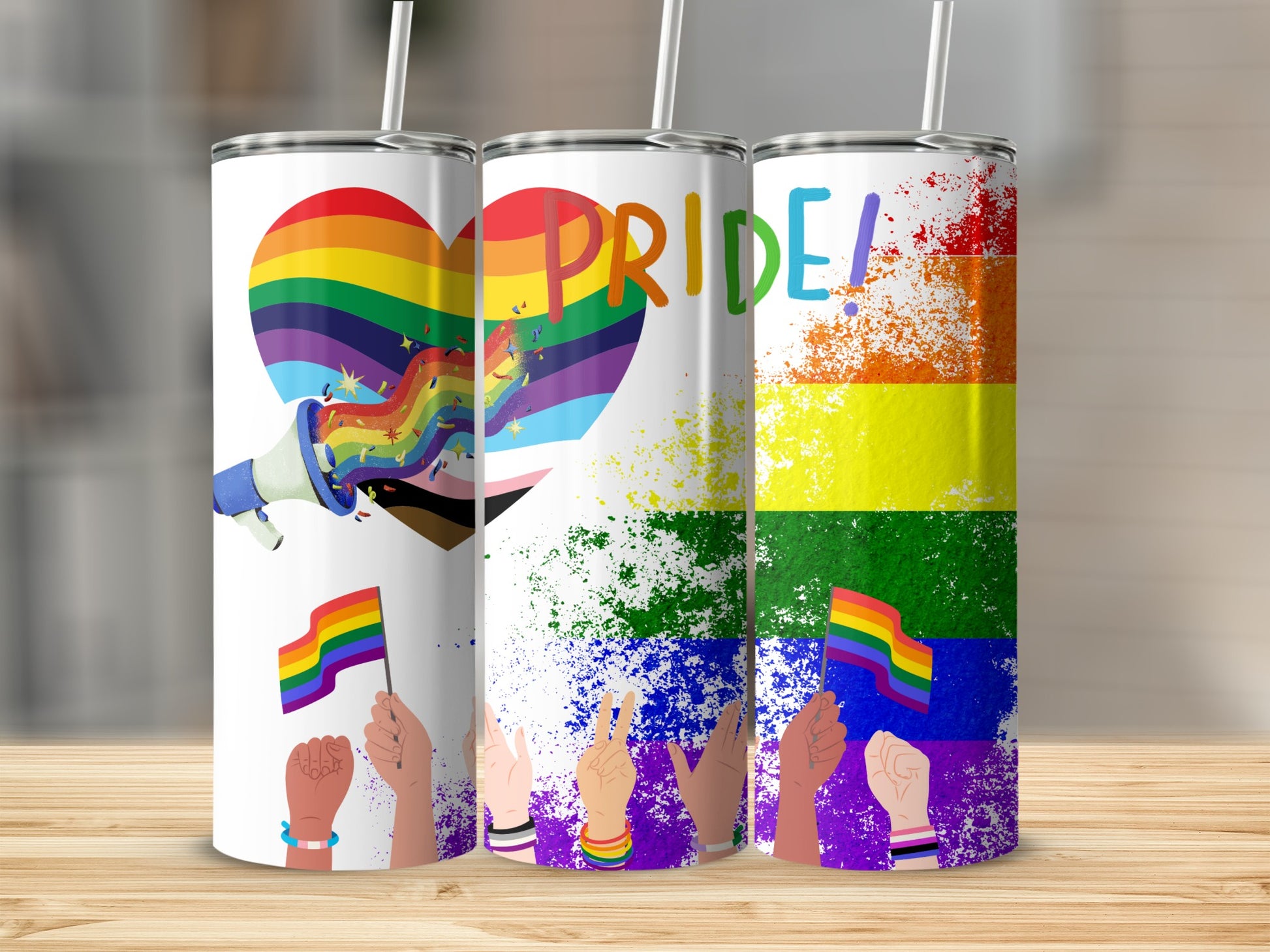 Pride tumbler with rainbow heart, megaphone, and hands holding pride flags.