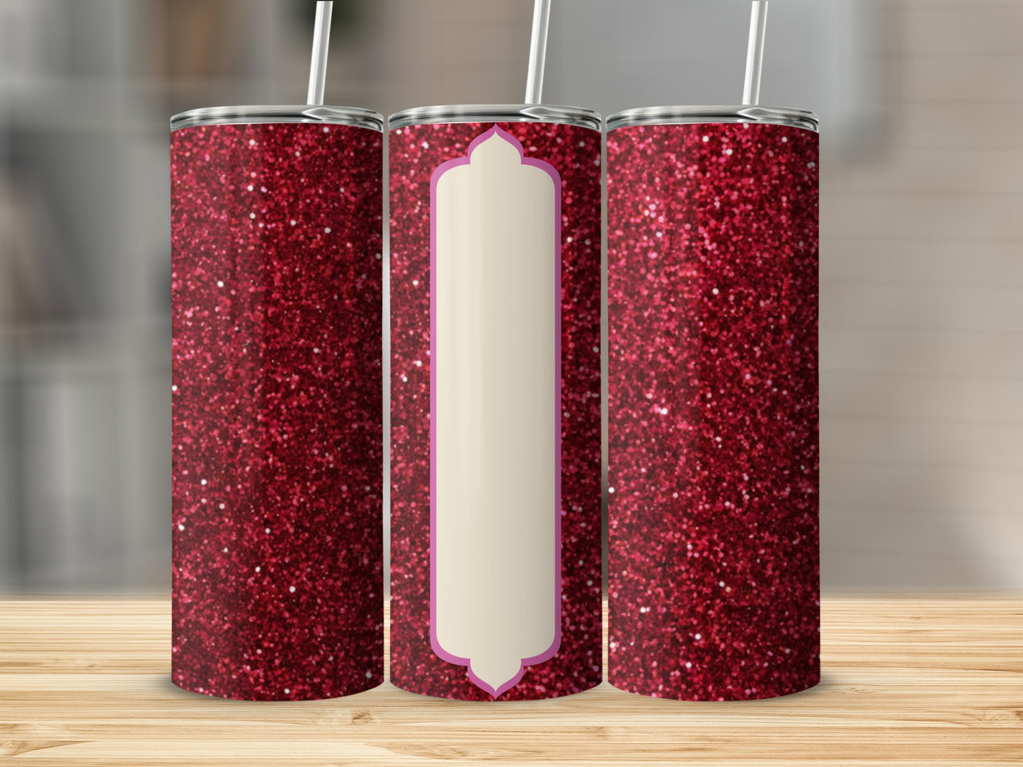 Red glitter tumbler with a cream-colored label and purple trim.