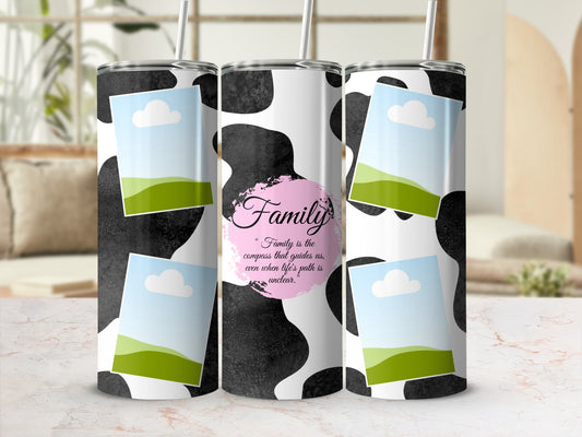 Tumblers with cow print, framed landscape photos, and the quote "Family is the compass."