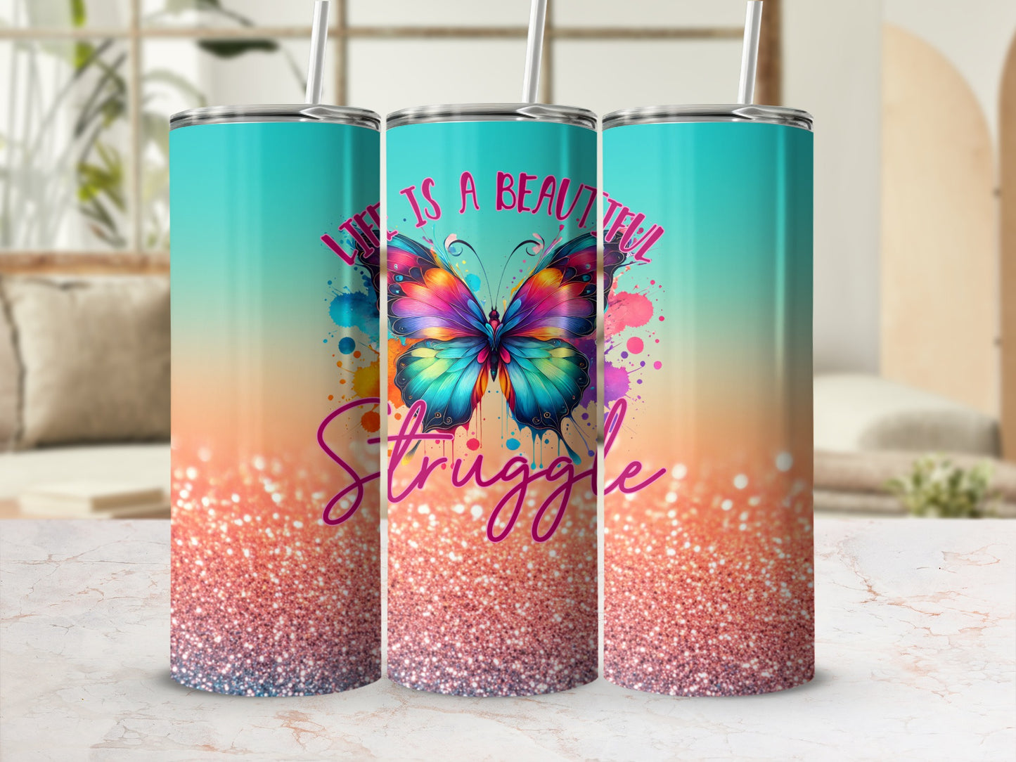 Tumbler with colorful butterfly and "Life is a beautiful struggle" text.