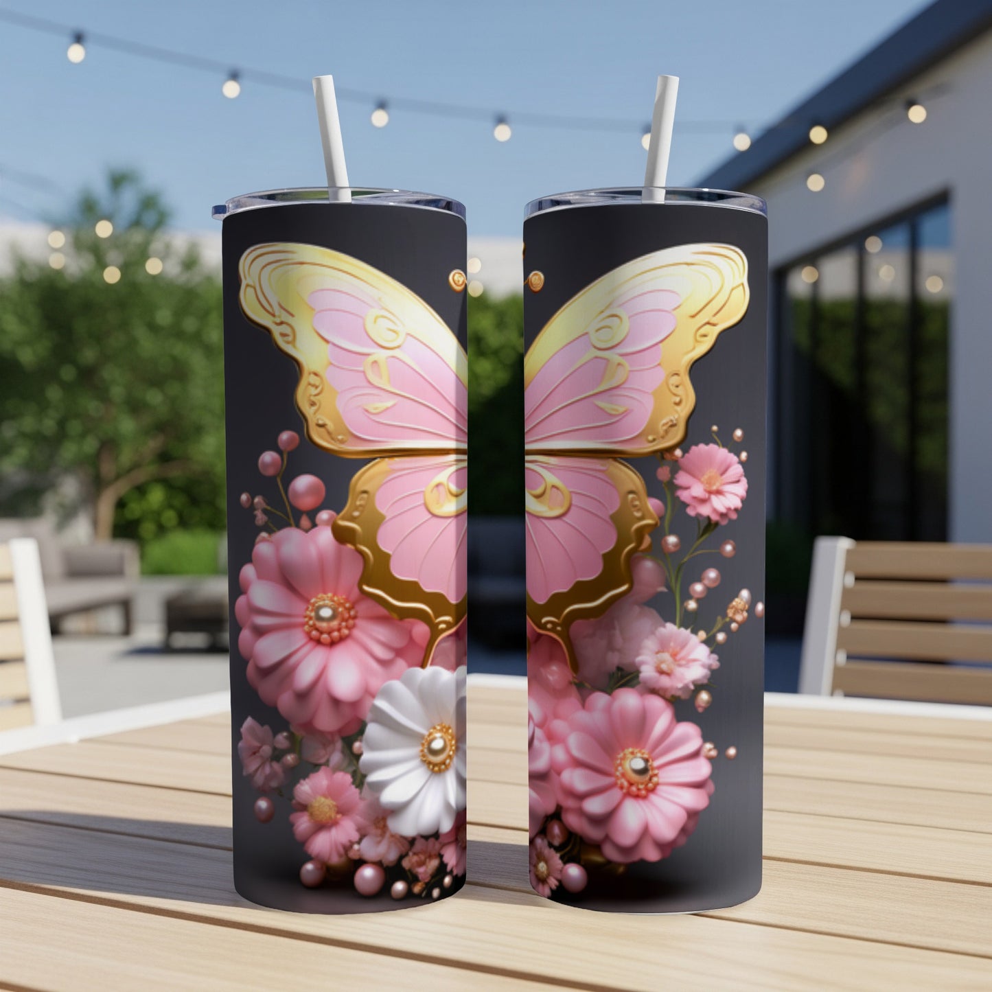 Pink butterfly with gold accents and floral embellishments on a dark tumbler.
