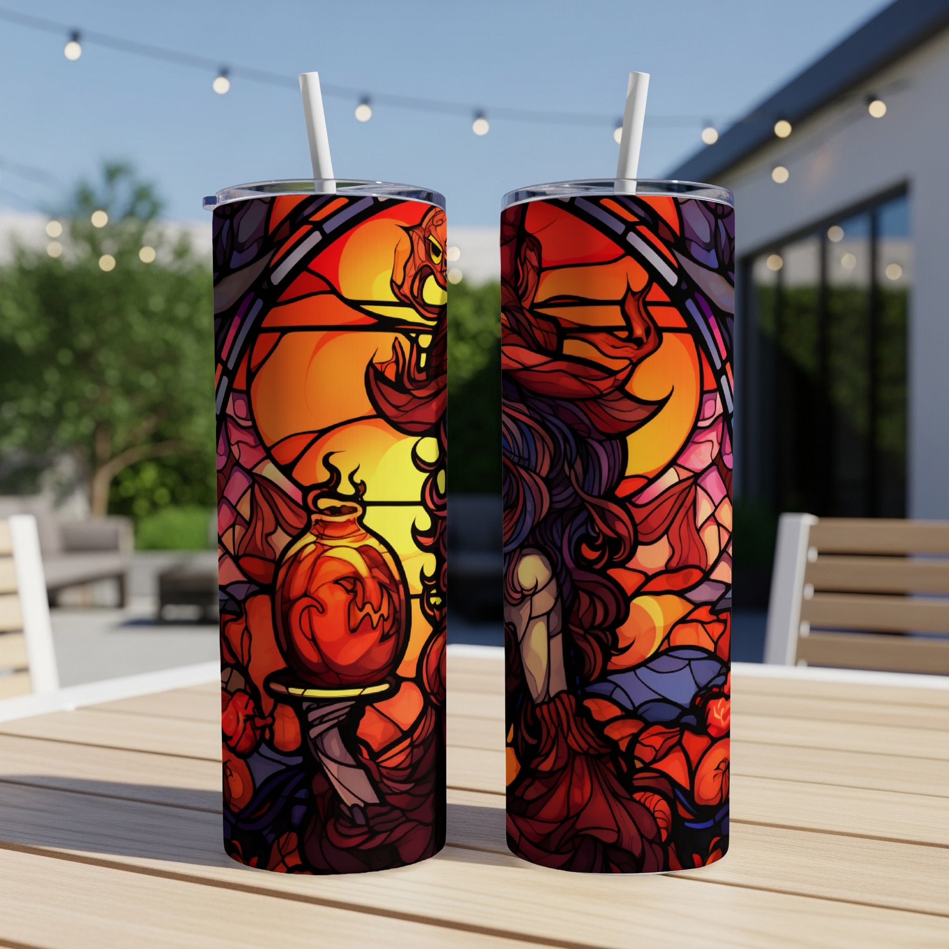 Two stained-glass style tumblers with a witch and cauldron design.
