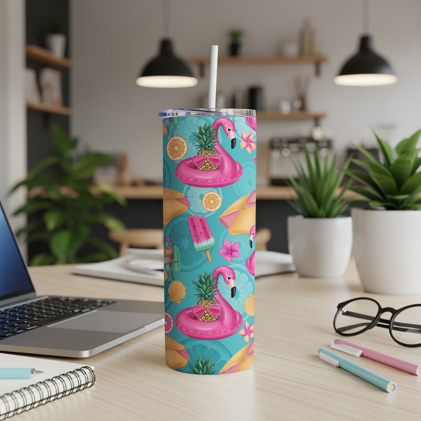 Pink flamingo and pineapple tumbler with summer beach motifs.