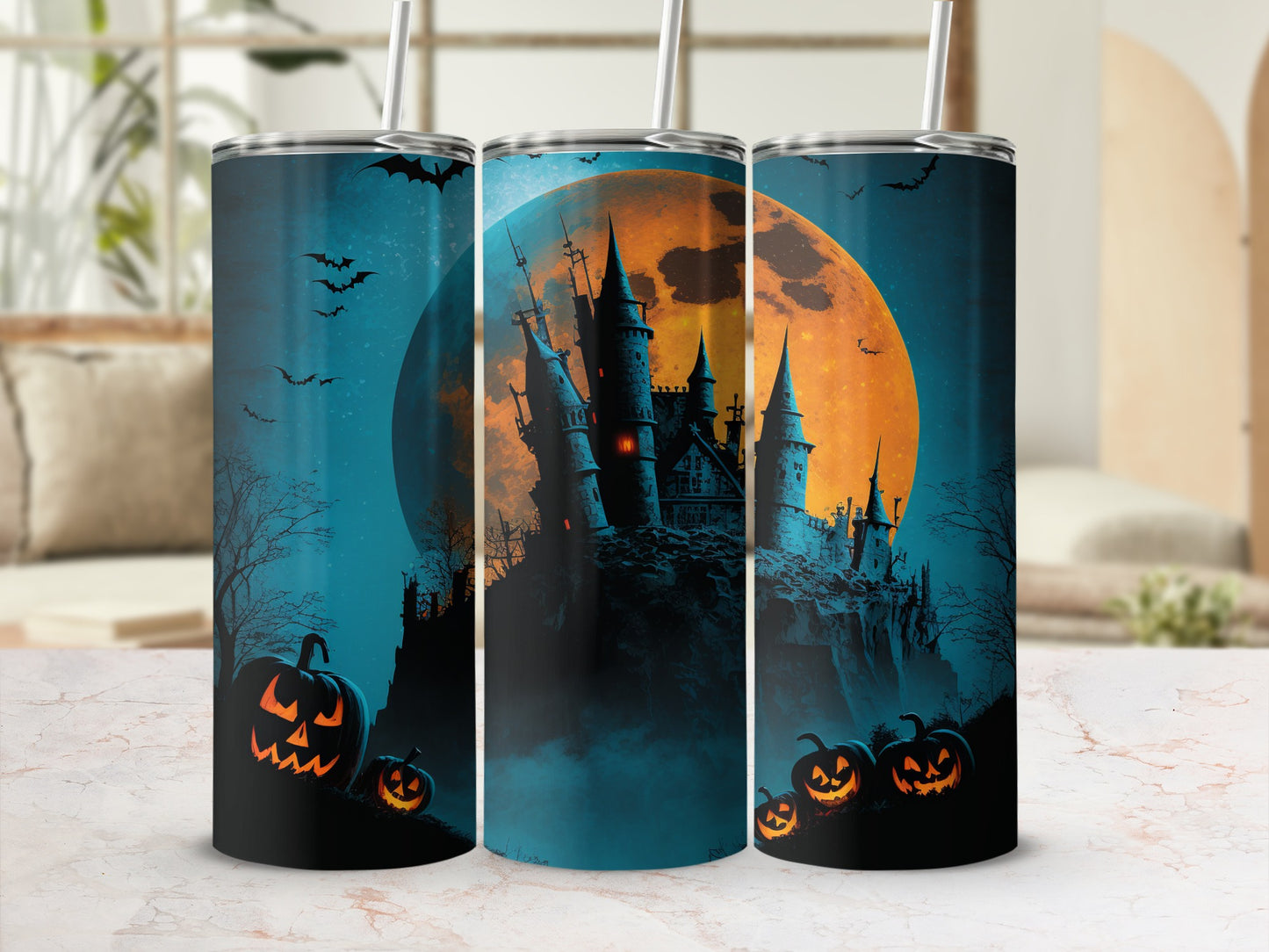 Halloween tumblers with spooky castle, full moon, bats, and jack-o'-lanterns.