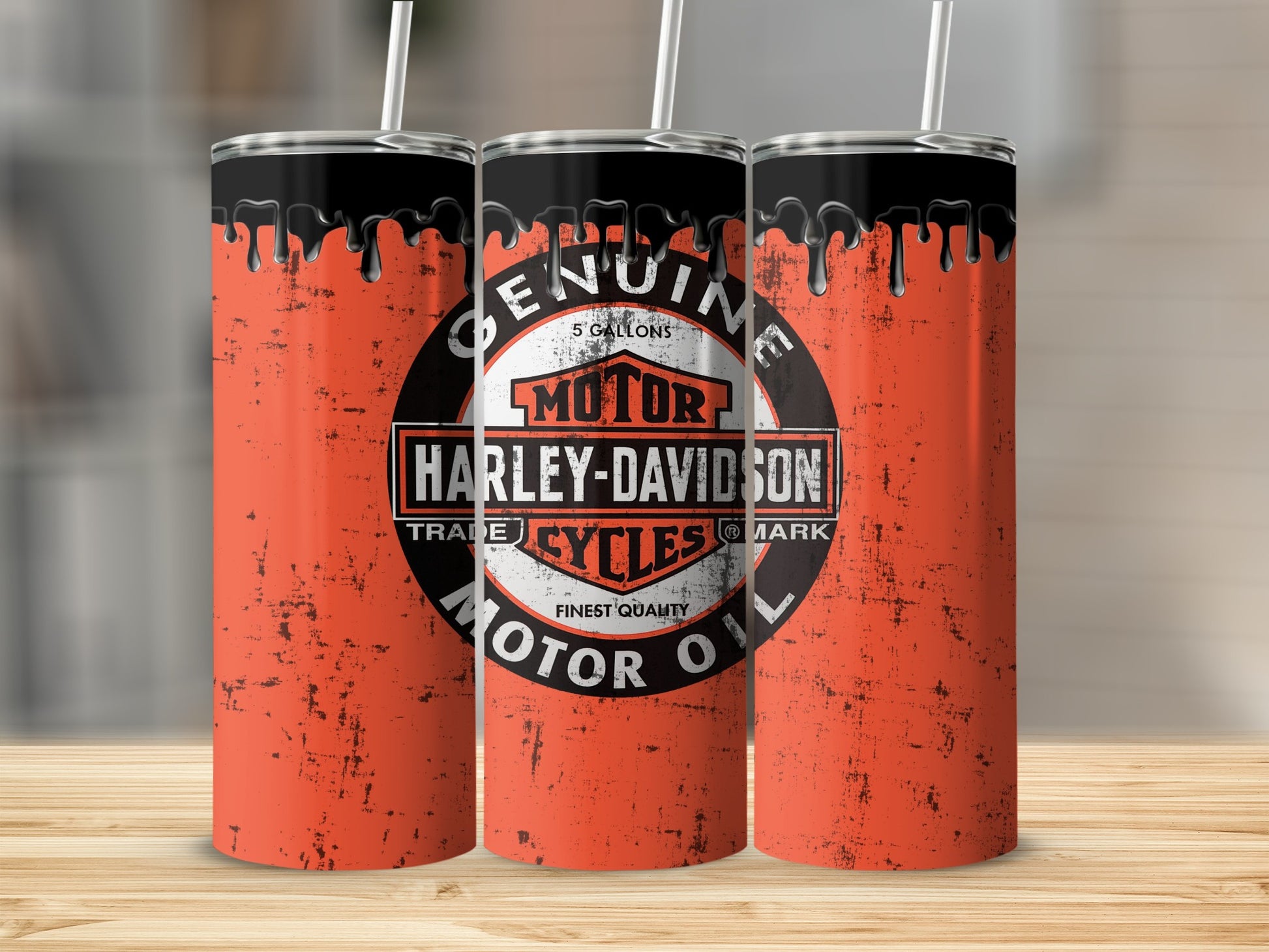 Orange tumbler with Harley-Davidson logo and dripping oil design.