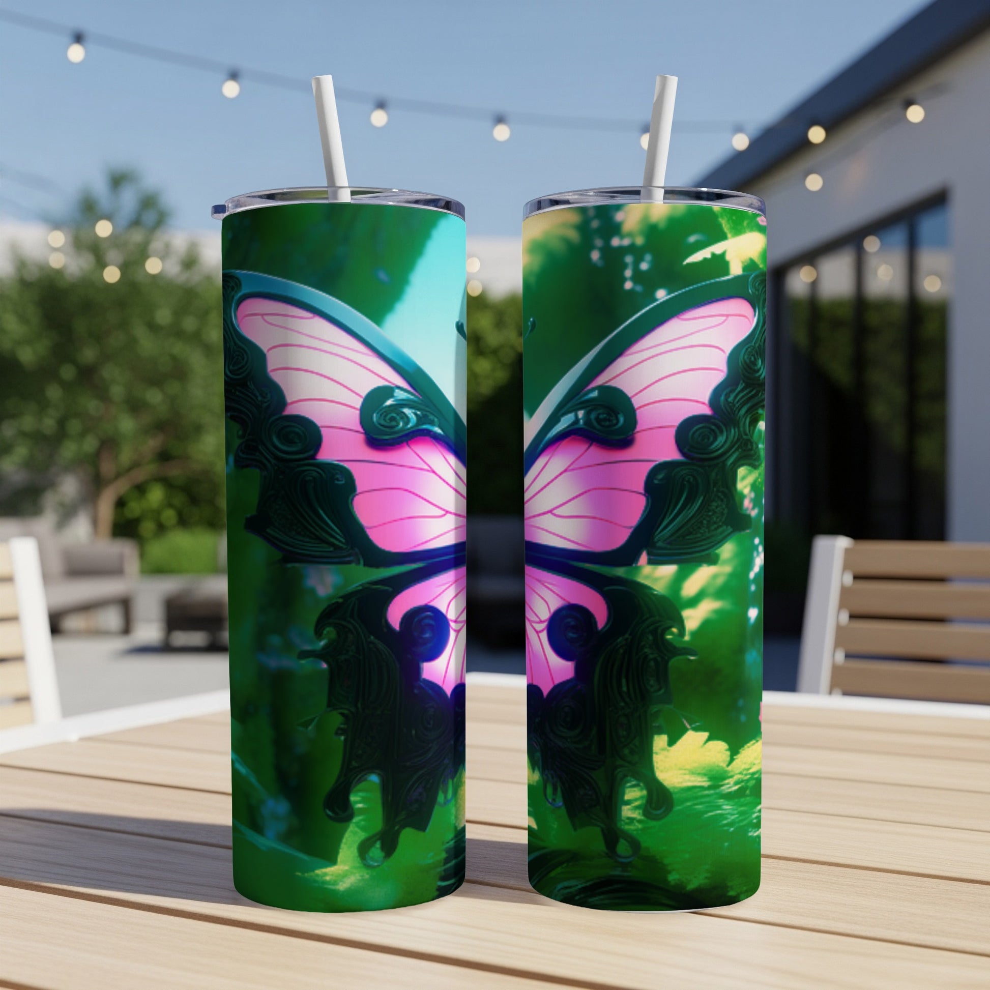 Two tall tumblers with a vibrant butterfly design.