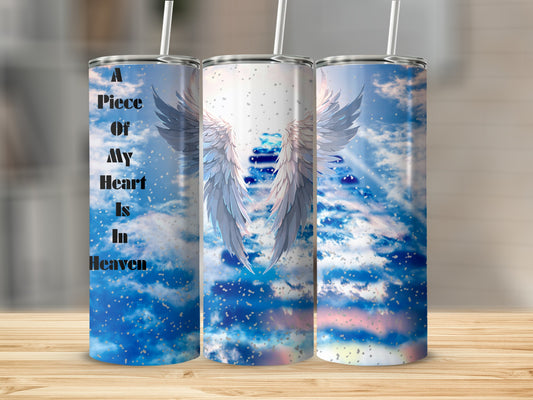Tumbler with angel wings and "A Piece Of My Heart Is In Heaven" text.