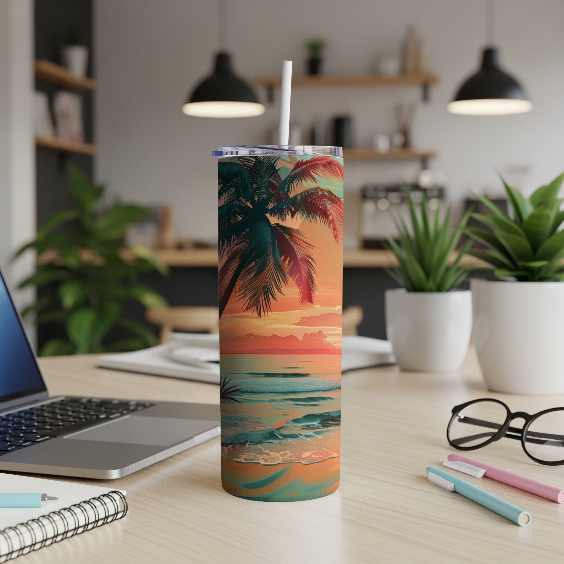 Palm tree sunset over ocean waves on a reusable tumbler.