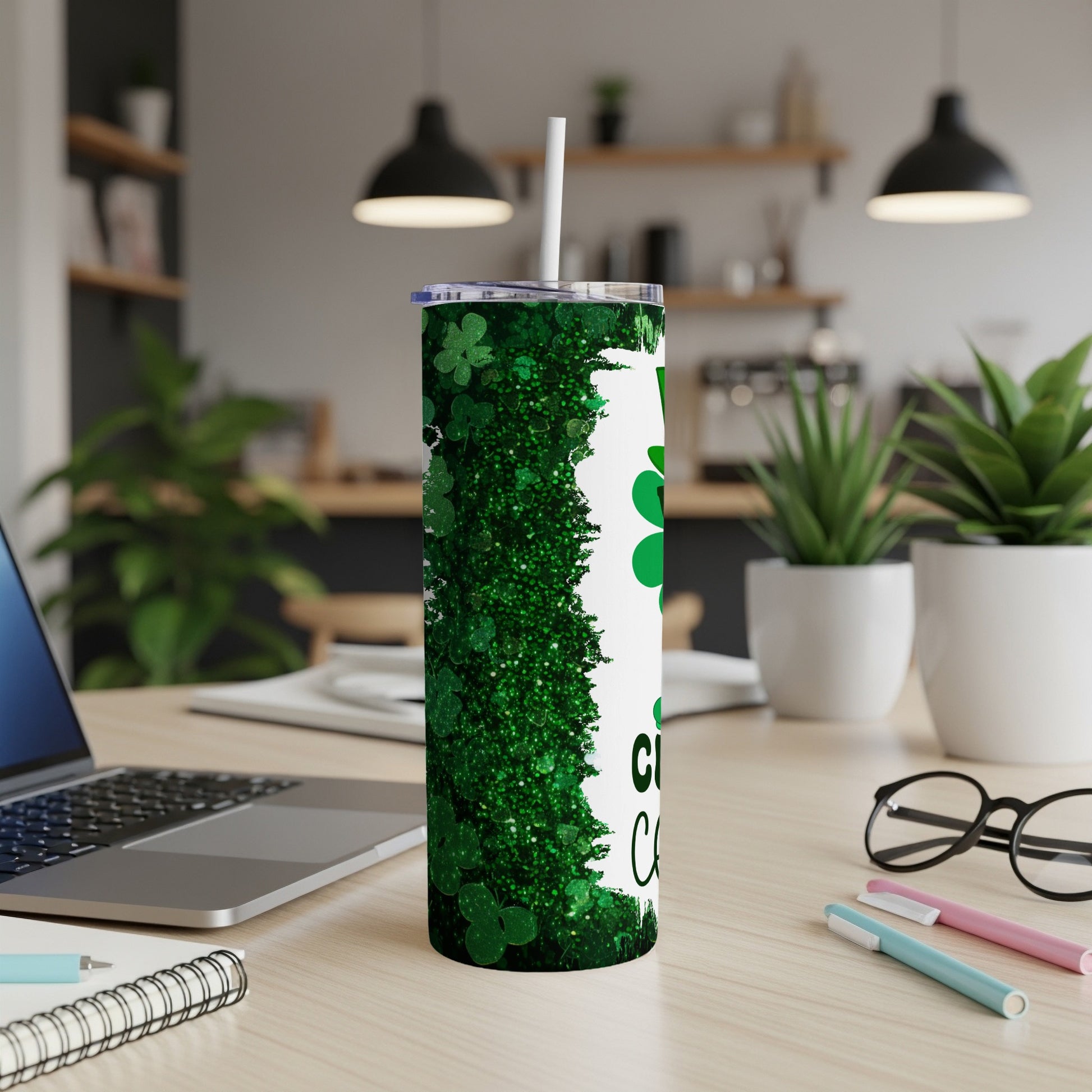 Green glitter tumbler with shamrocks and text "Lucky Charm".