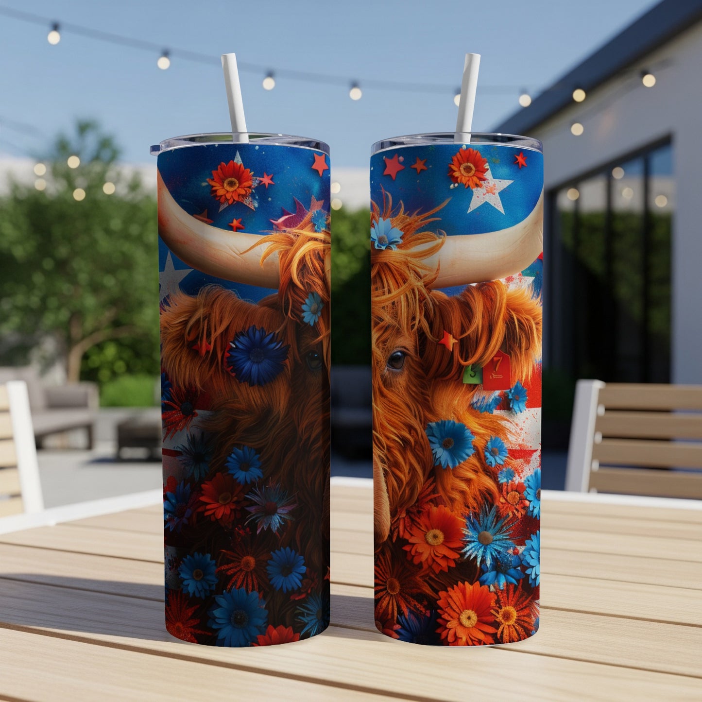 Highland cow with American flag flowers on a patriotic tumbler.
