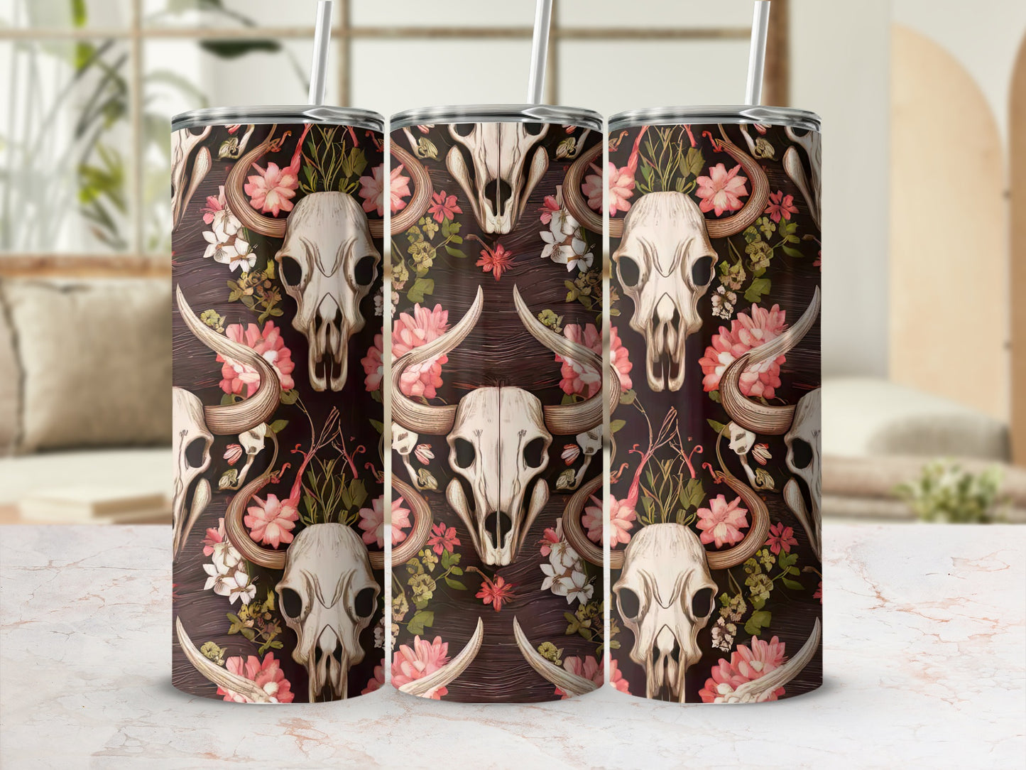 Cow skull and floral pattern tumbler with straw.