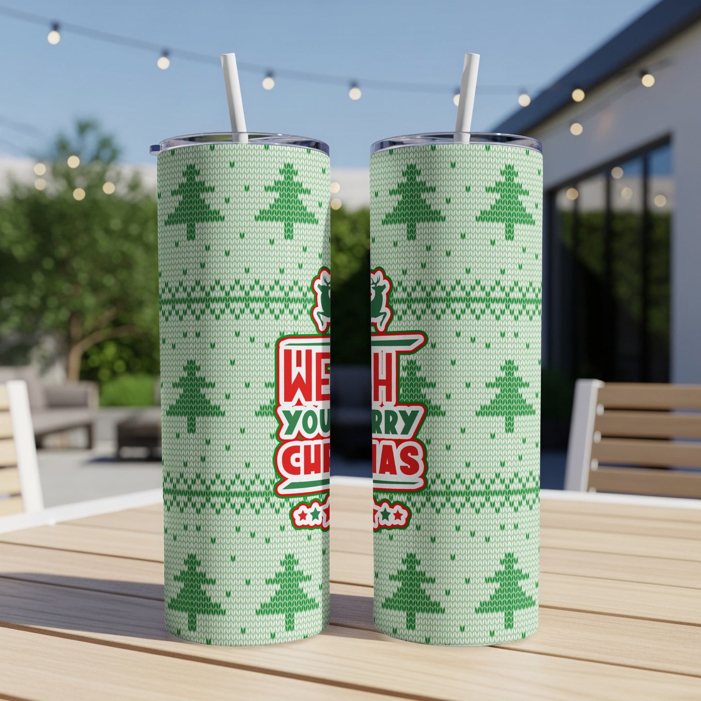 Two light green tumblers with Christmas tree pattern and "WE WISH YOU A MERRY CHRISTMAS" text.
