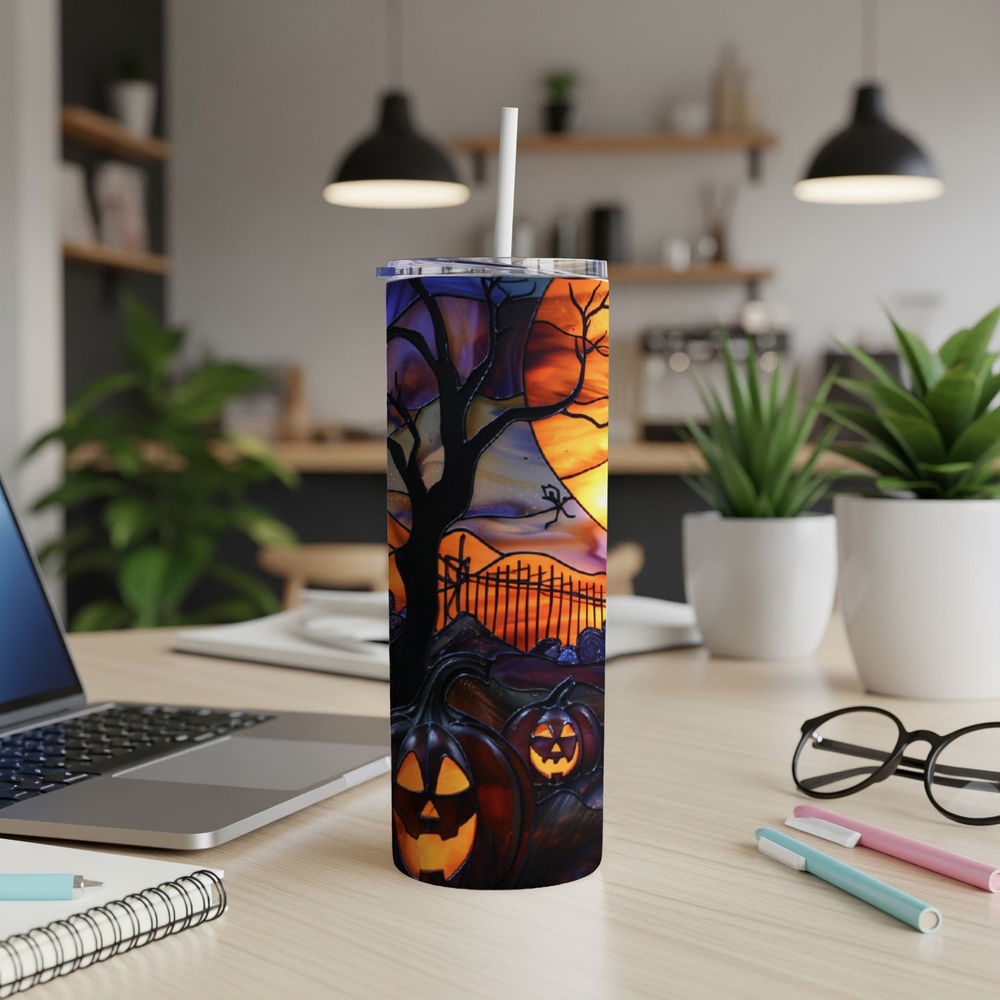 Halloween tumbler with pumpkins and a spooky tree in stained glass style.
