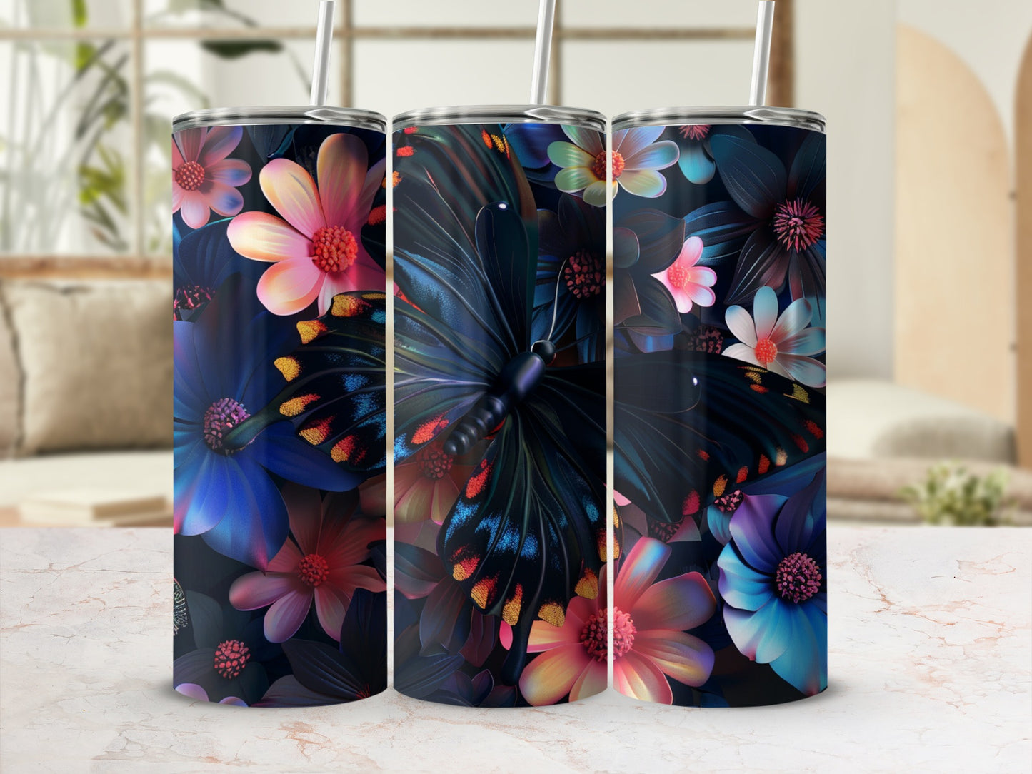Floral patterned tumbler with a butterfly centerpiece and reusable straw.