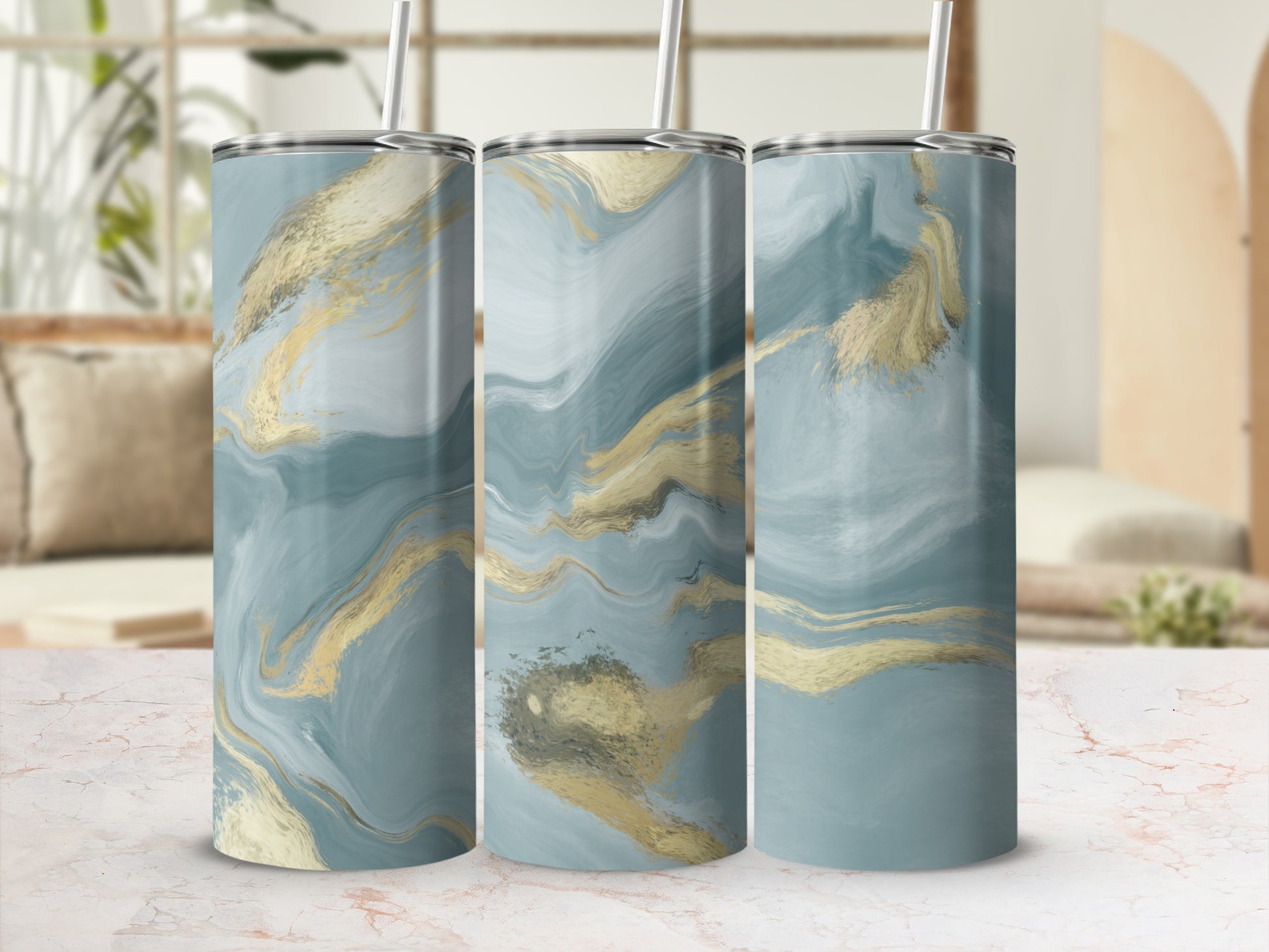 Three tumblers with blue and gold marble abstract design.