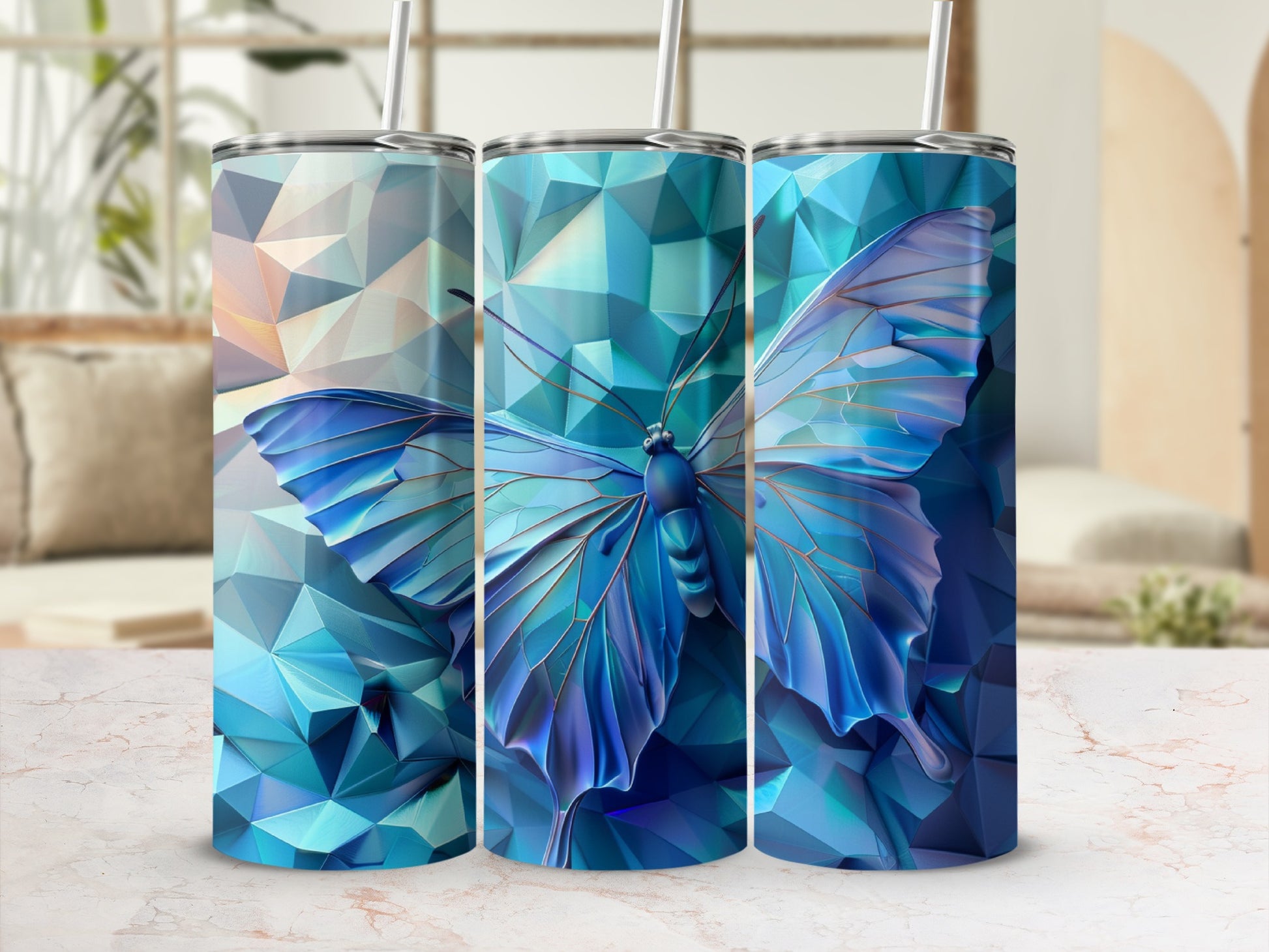 Three tumblers with blue butterfly on faceted crystal background.