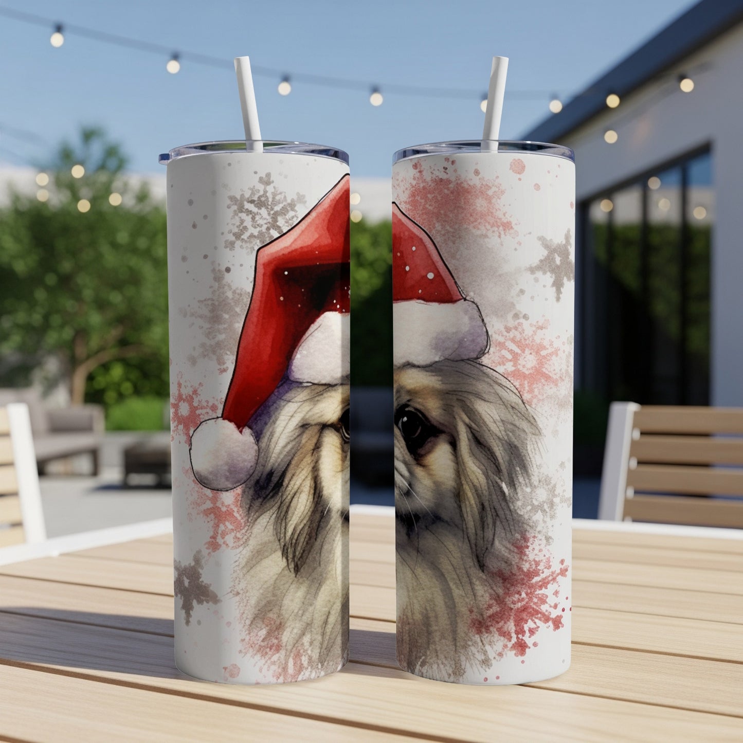 Two tumblers with a watercolor painting of a dog wearing a Santa hat.