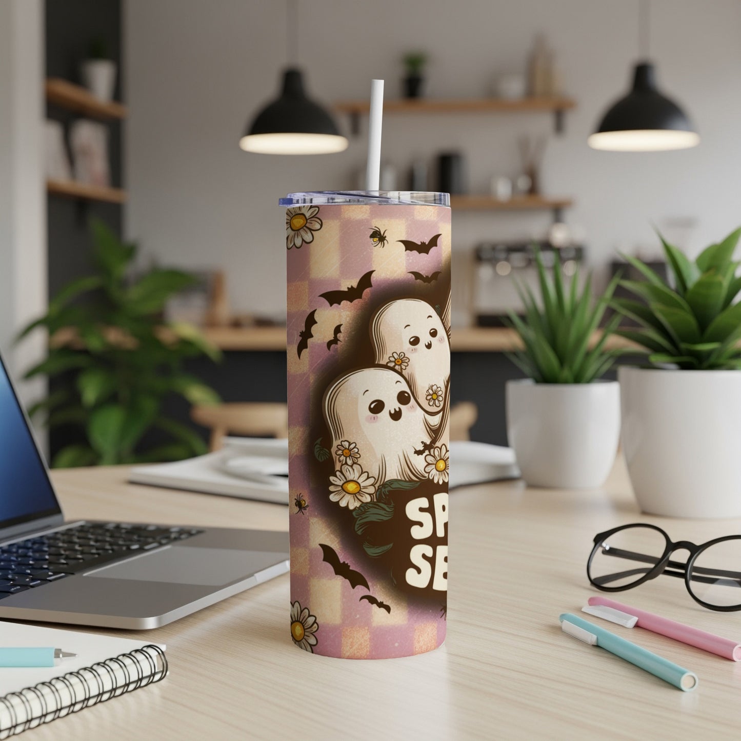 Halloween tumbler with ghosts, bats, and daisies with "Spooky Season" text.