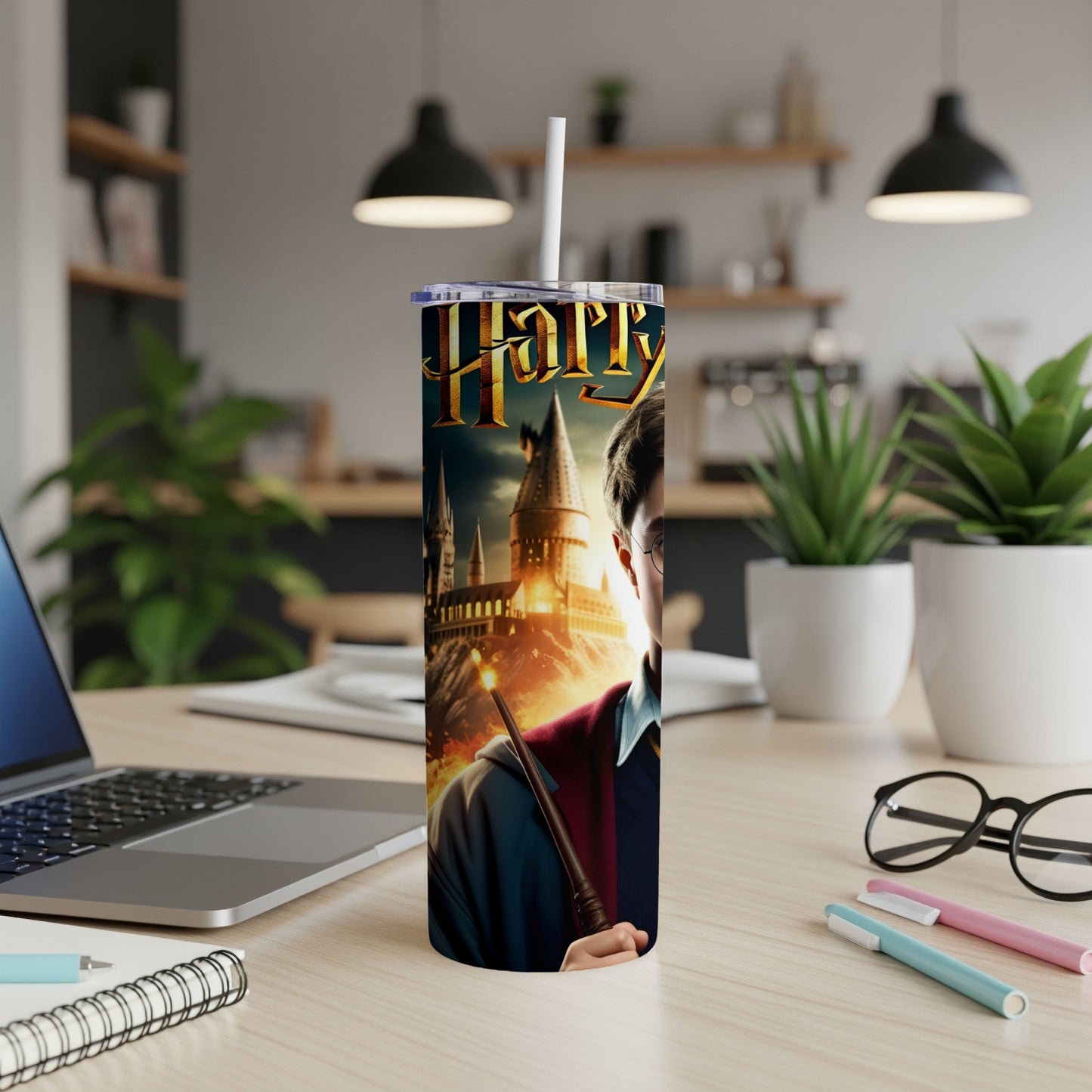 Harry Potter tumbler featuring Hogwarts castle and a young Harry with wand.
