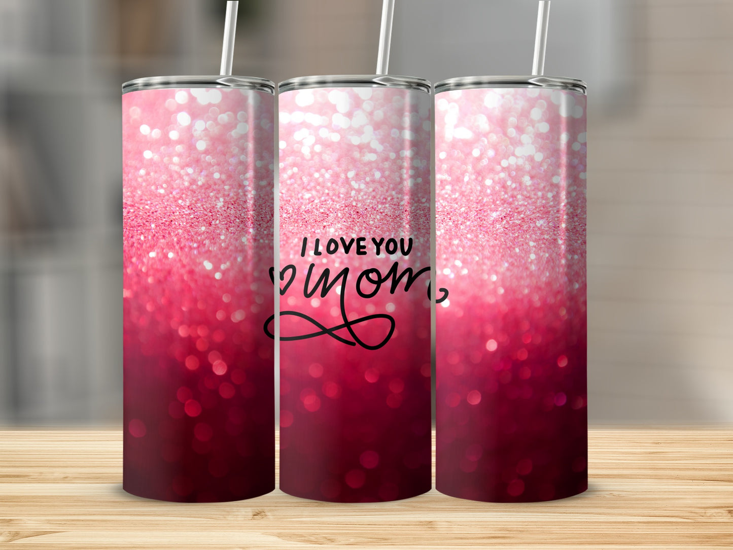 Pink glitter ombre tumbler with "I love you Mom" text.