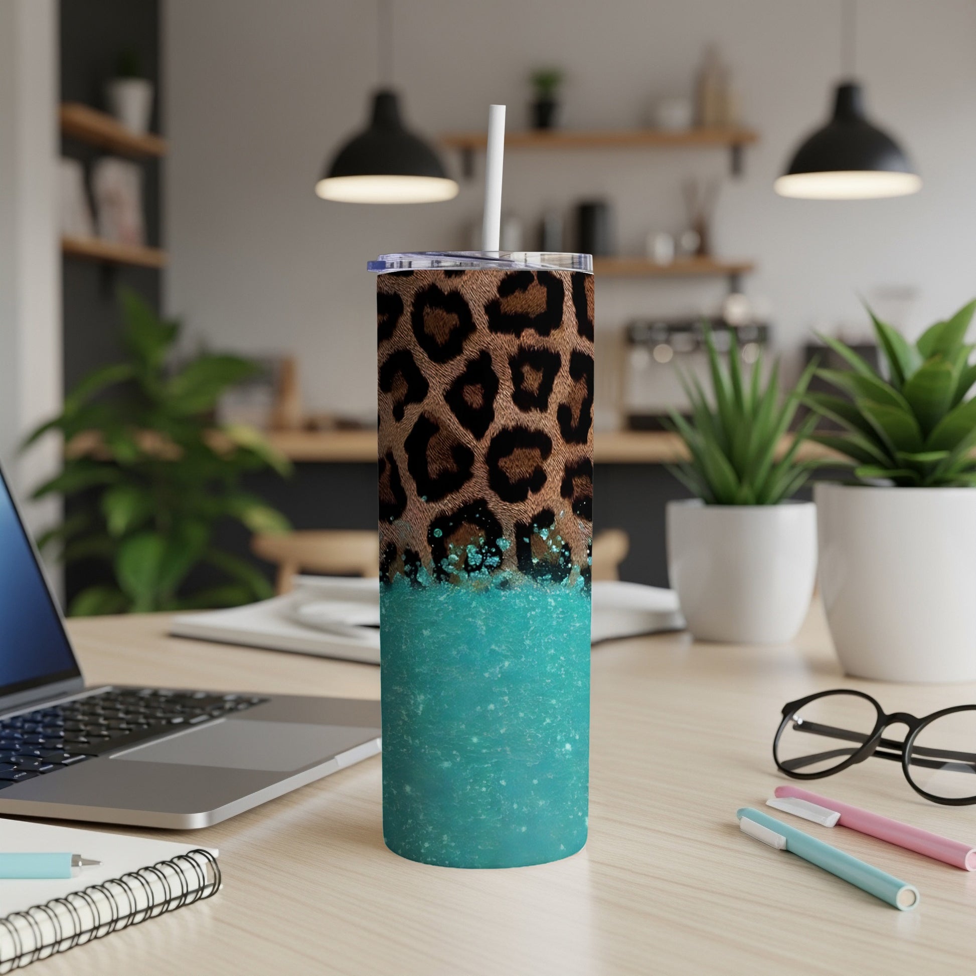 Leopard print tumbler with turquoise glitter.