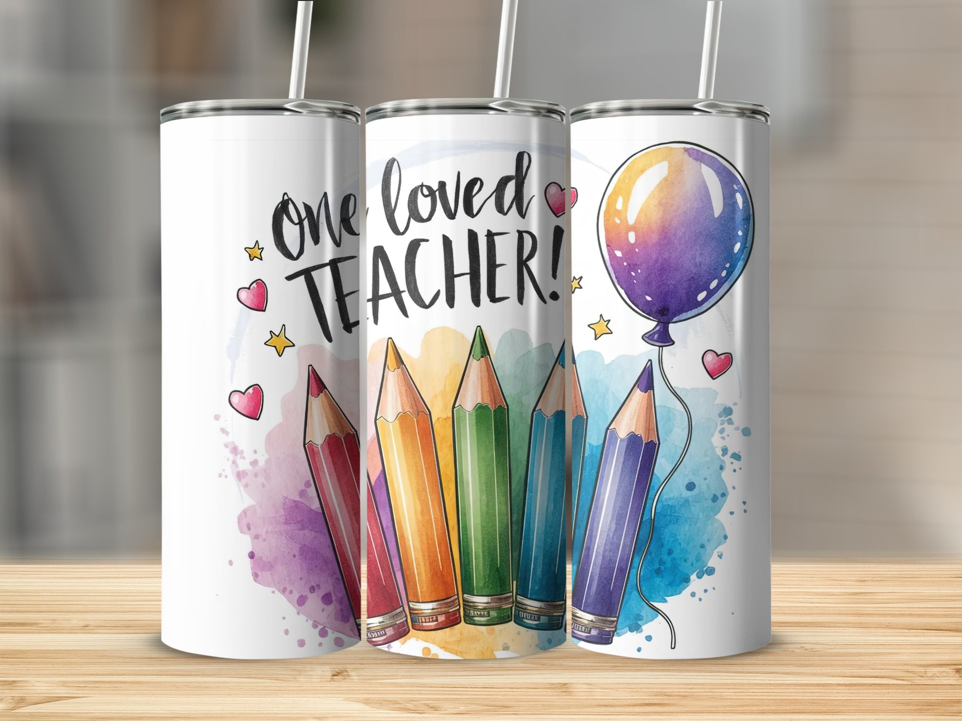 Teacher tumbler with colorful pencils and a balloon.
