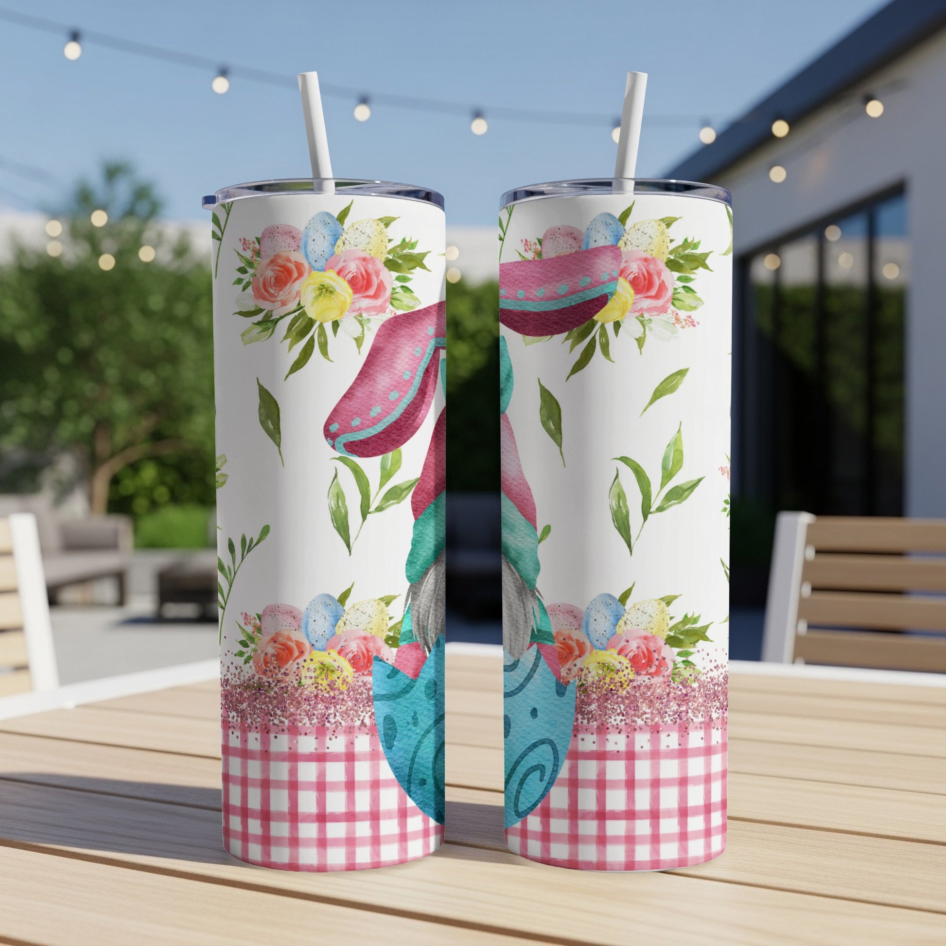 Two white tumblers with pink gingham, Easter eggs, and floral bunny ears.