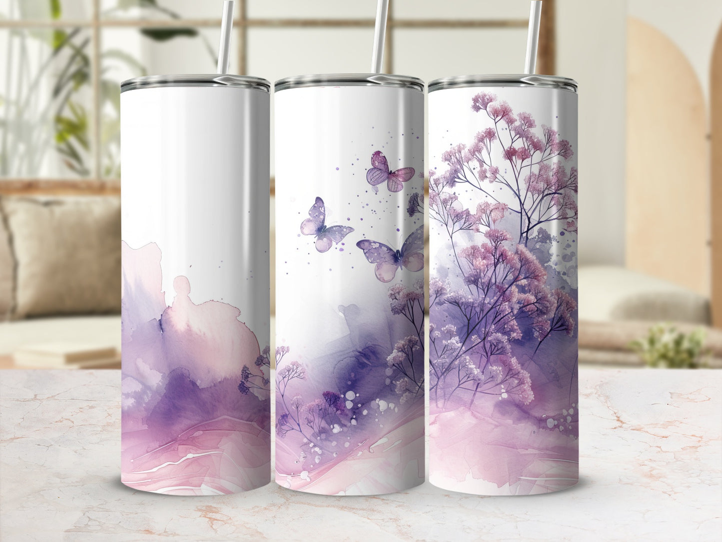 Three tumblers with a purple watercolor floral and butterfly design.