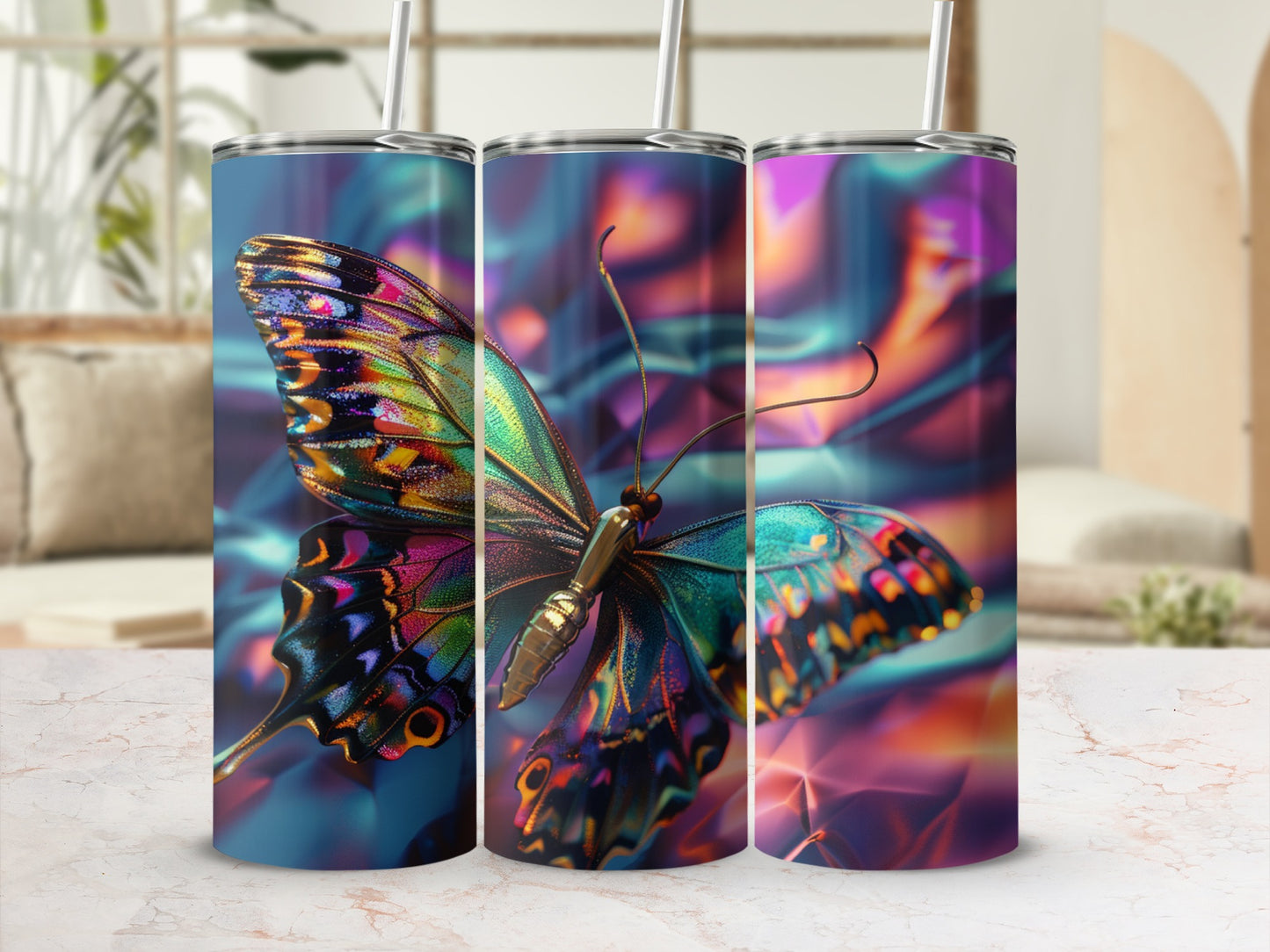 Holographic butterfly design on three cylindrical tumblers.