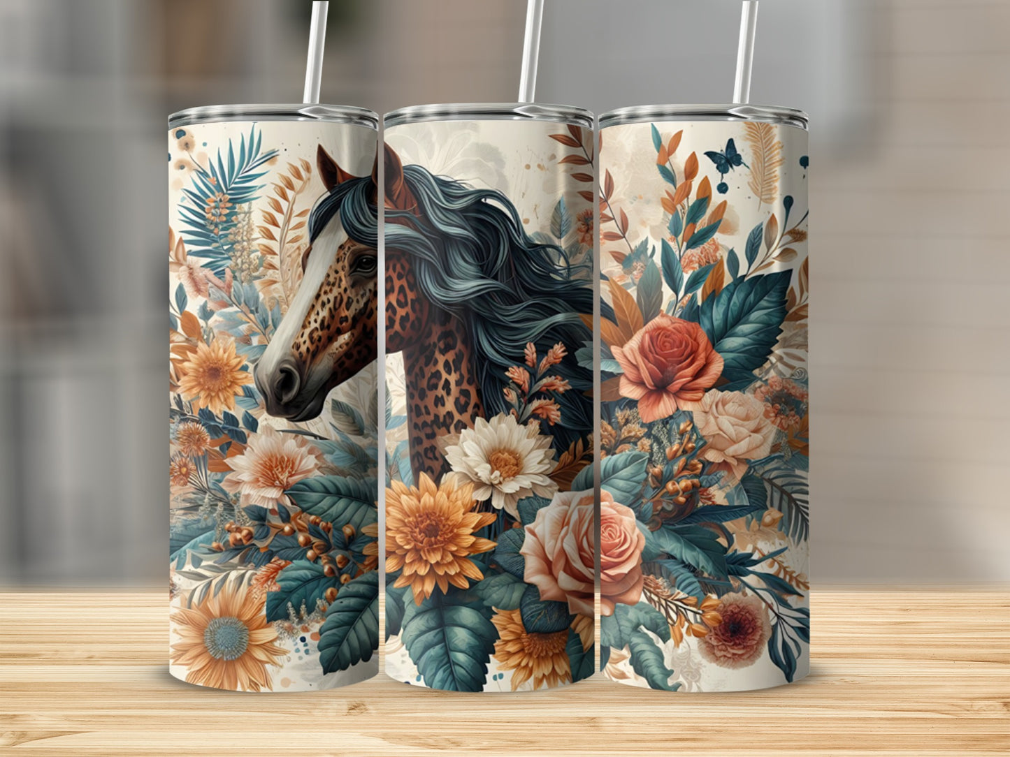 Three tumblers with horse and floral designs, one showing a horse's head.