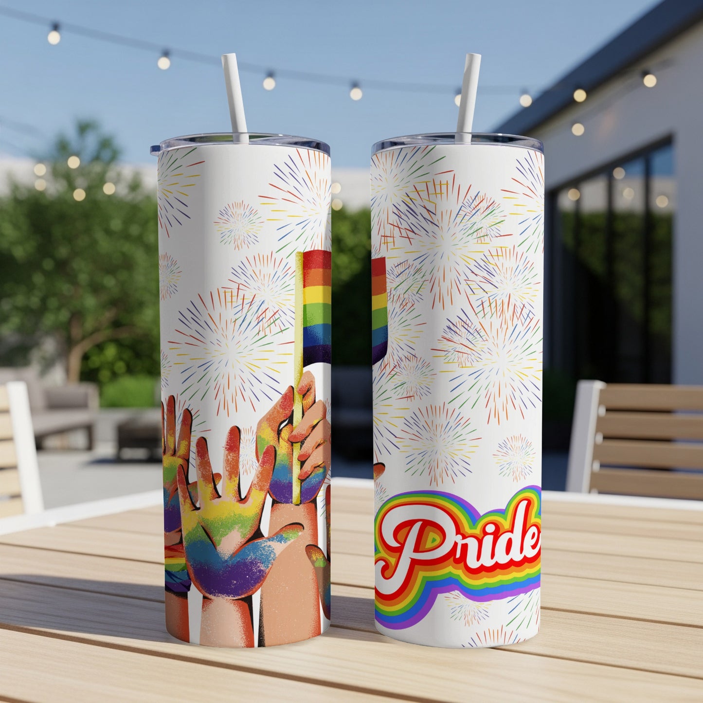 Rainbow Pride hands and fireworks design on two tall tumblers.