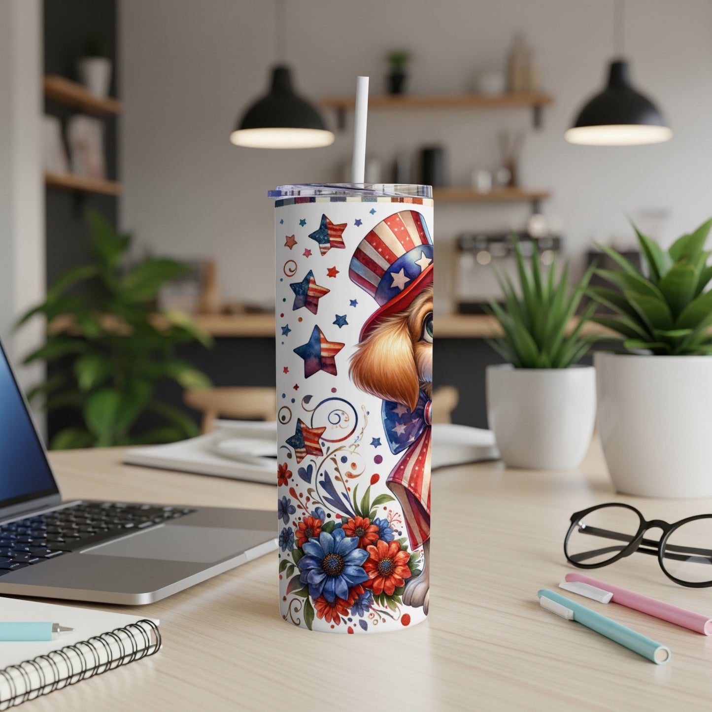 Patriotic dog with stars and flowers on a tumbler with a straw.