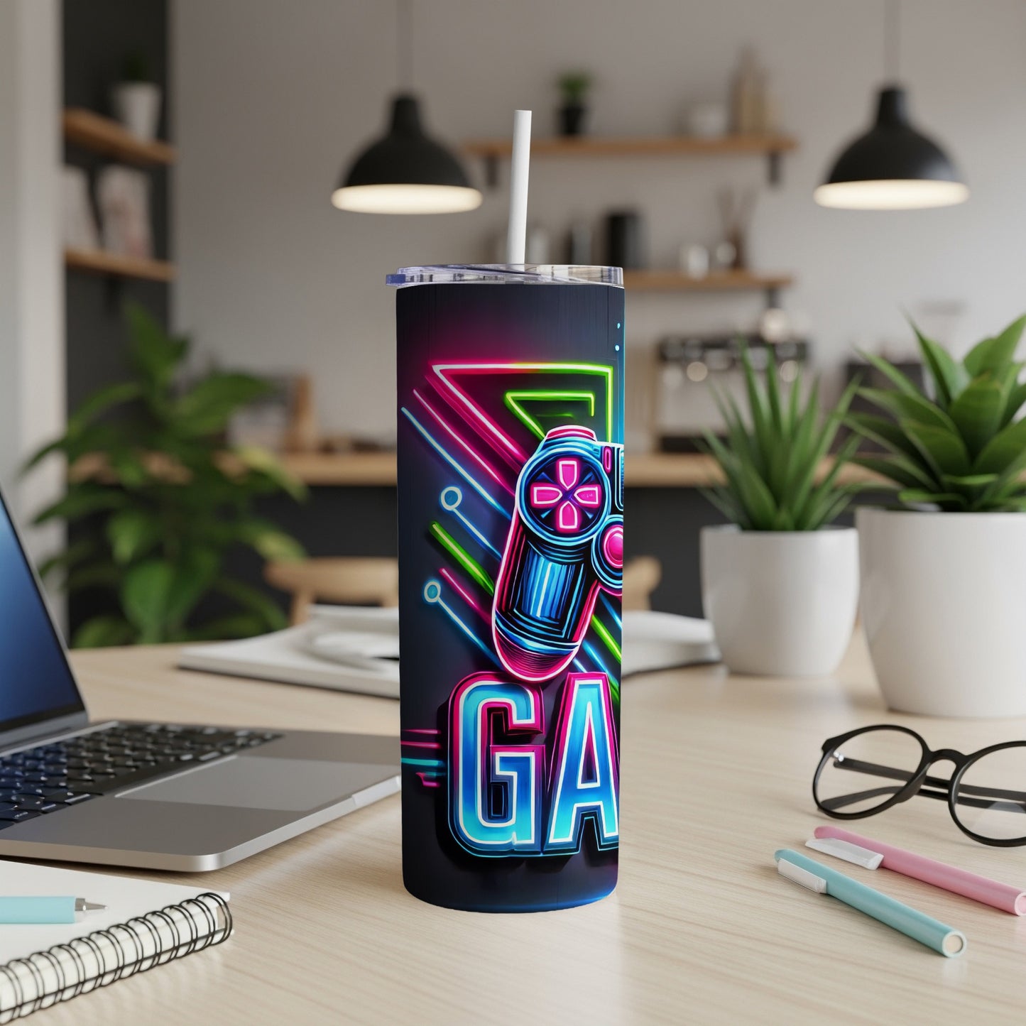 Neon gamer controller and "GAMER" text on a tumbler.
