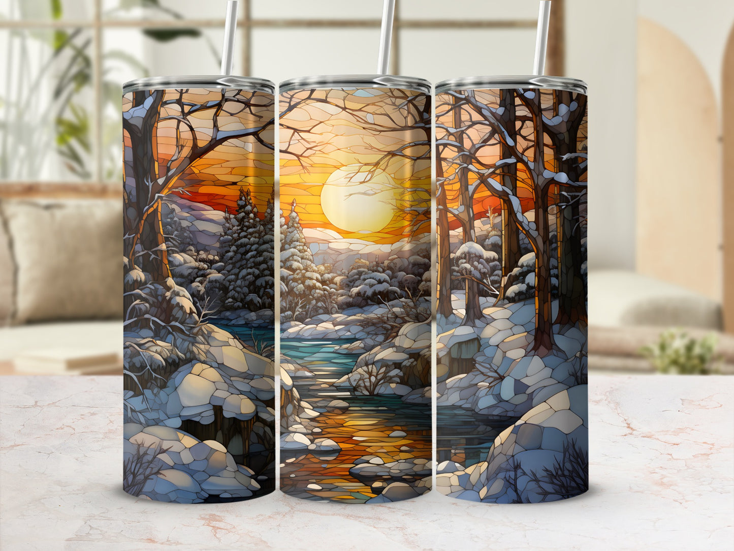 Three tumblers with a snowy winter forest sunset landscape design.