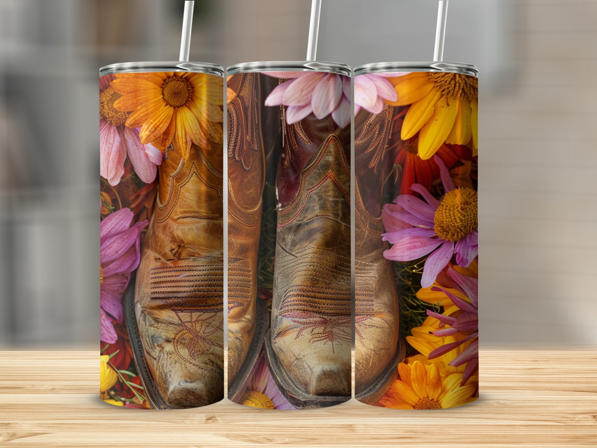 Western cowboy boots and colorful flowers on a tumbler.
