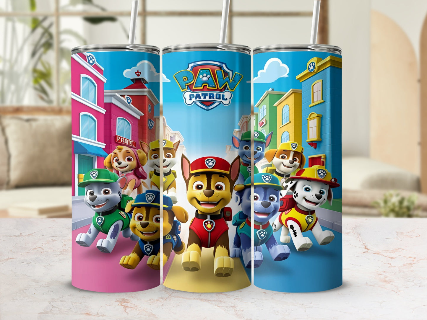 Paw Patrol characters on three tall tumblers with straws.